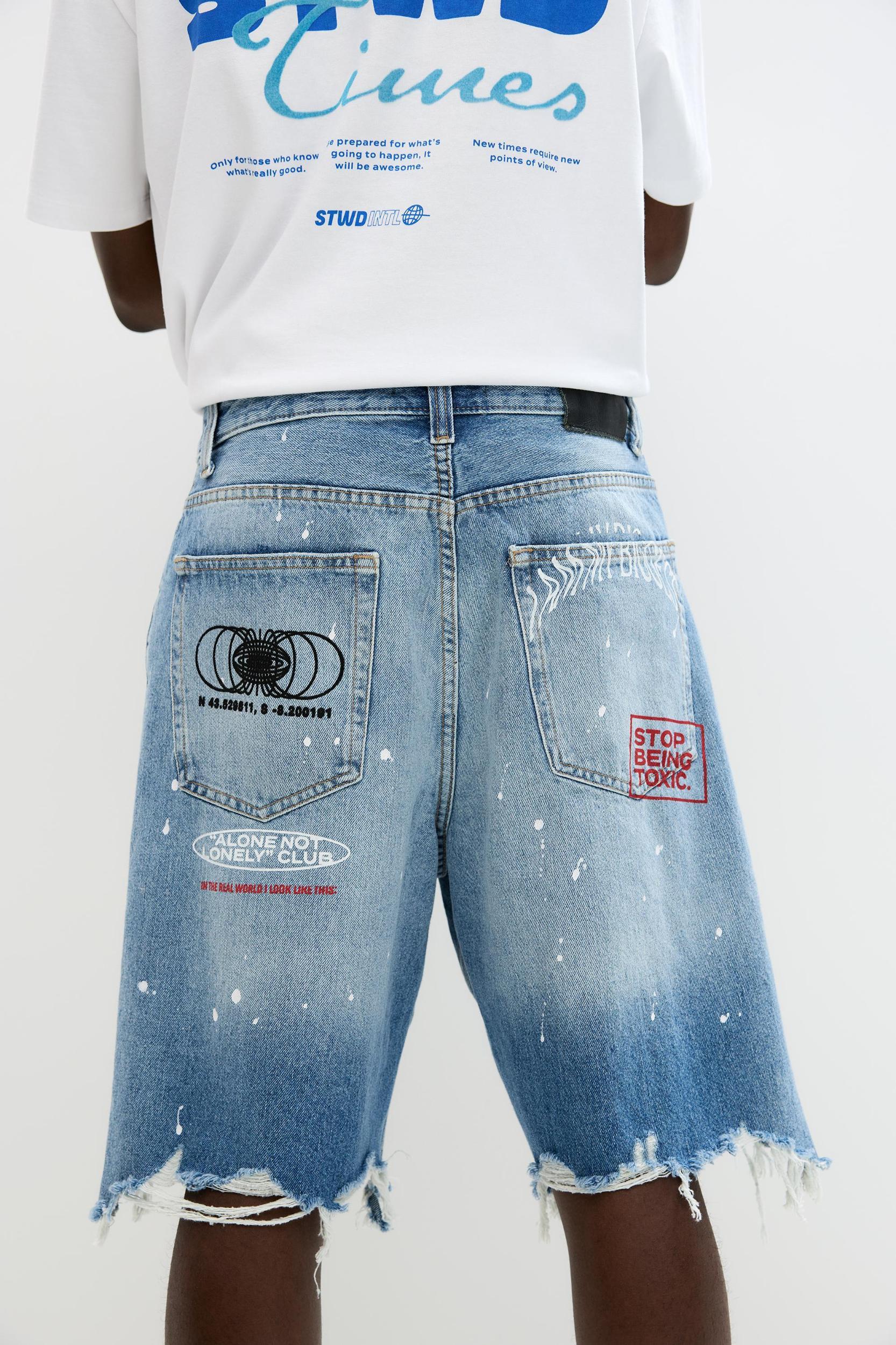 Ripped denim Bermuda shorts Product Image
