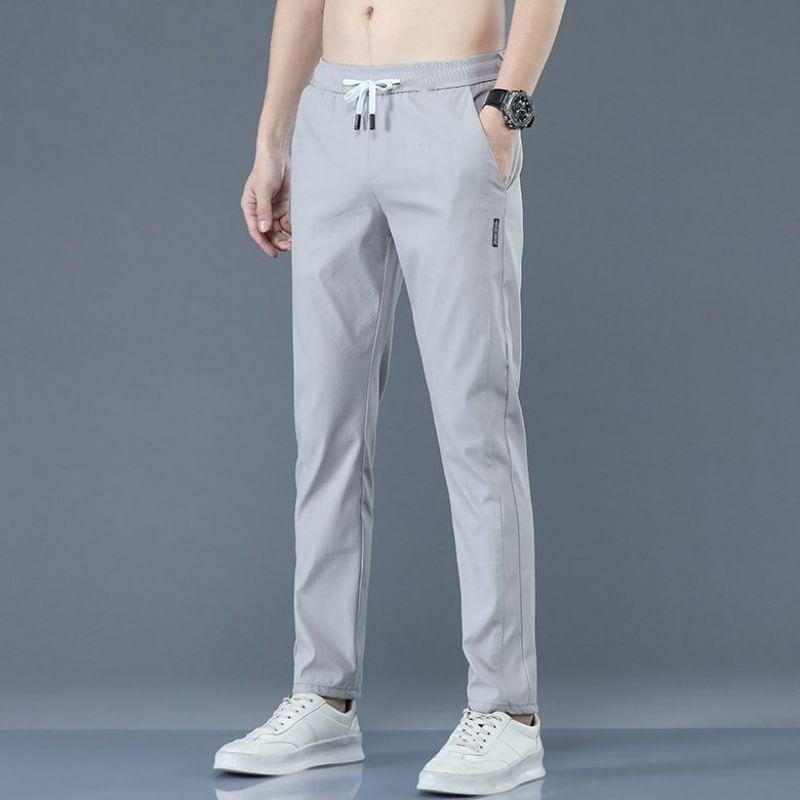 Drawstring Waist Applique Tapered Pants Product Image
