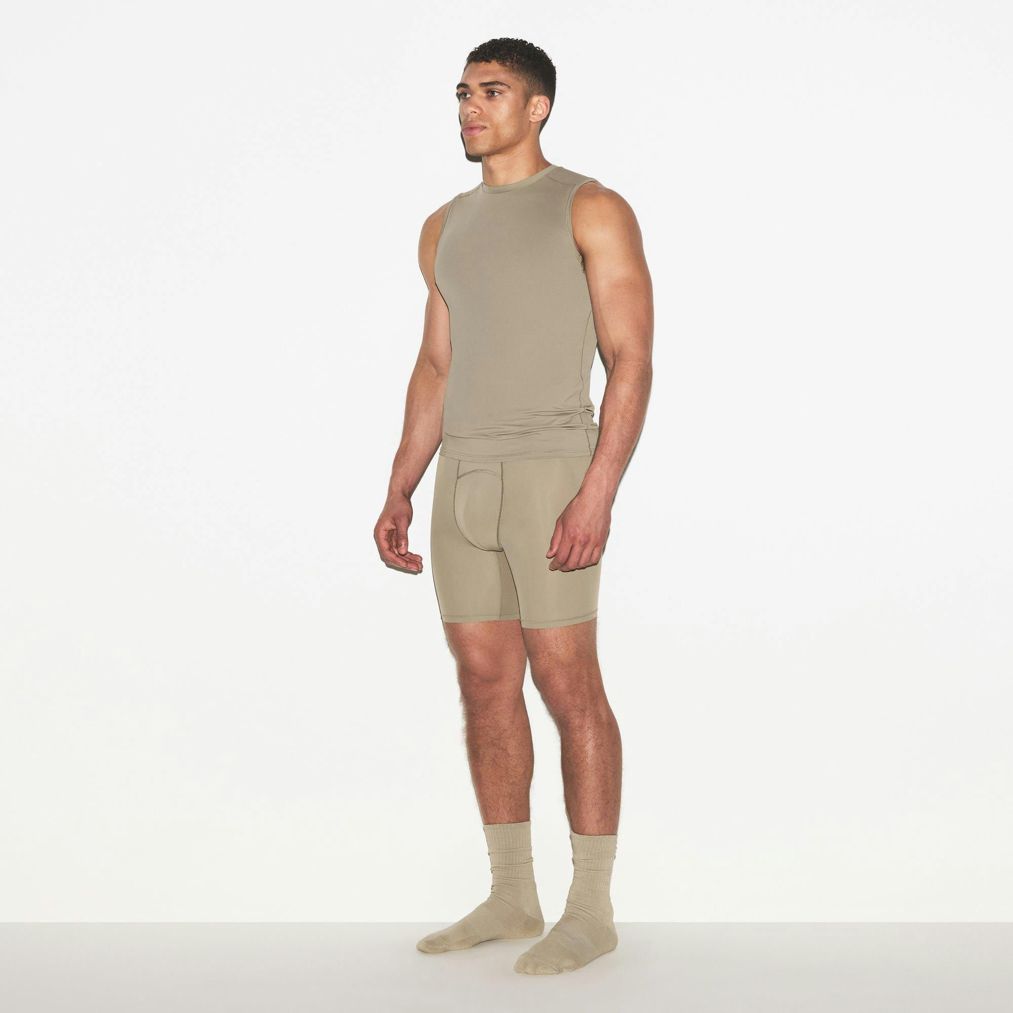 SKIMS FLEX MENS MUSCLE TANK | DUNE Product Image