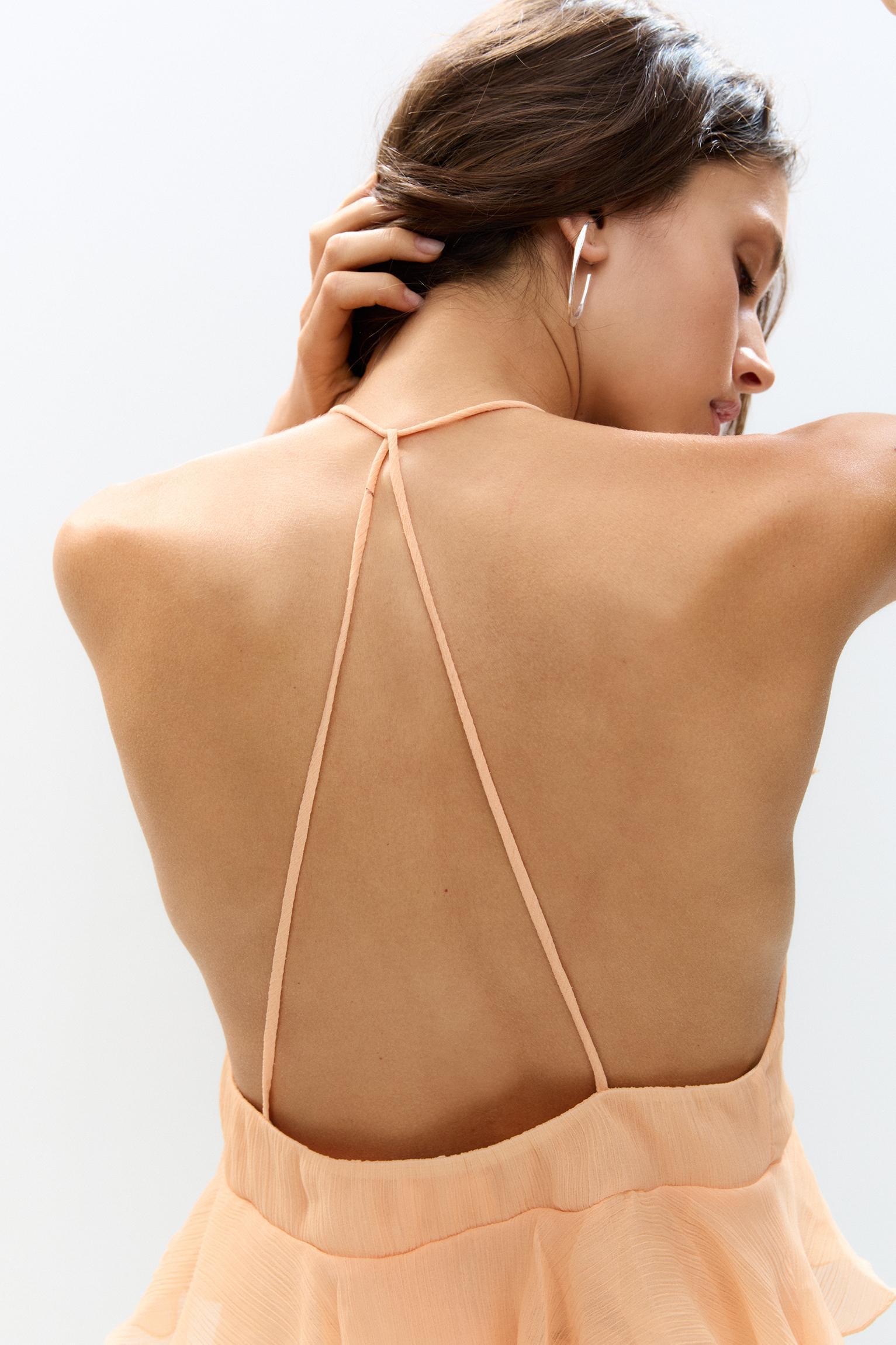 Ruffled top with bow Product Image