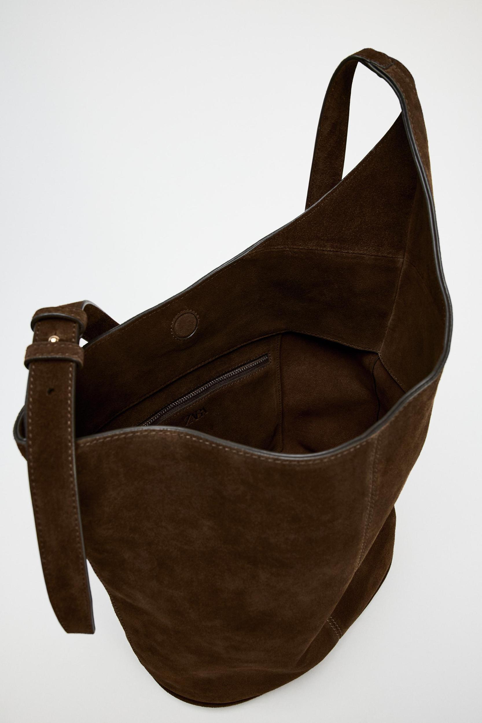 ASYMMETRIC SOFT SPLIT LEATHER BUCKET BAG Product Image