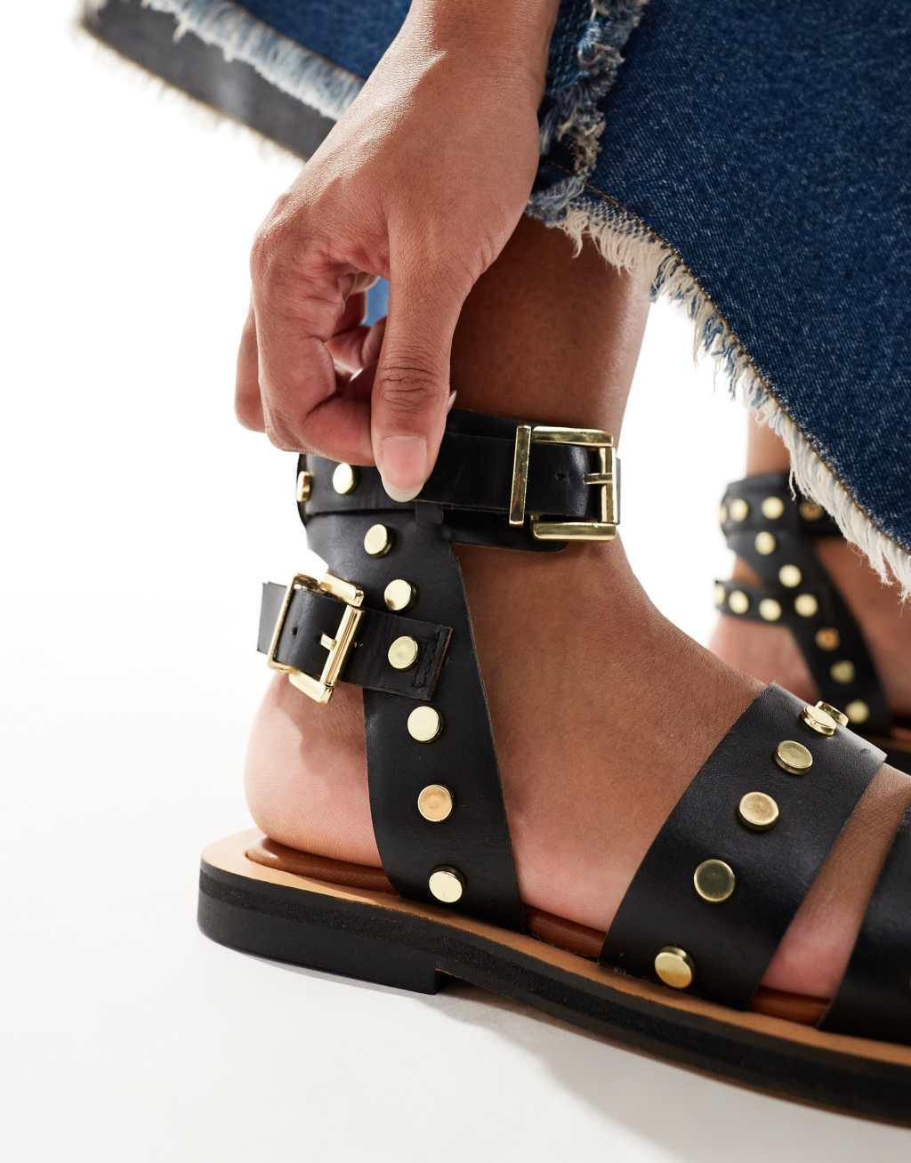 ASOS DESIGN Fiji leather studded flat sandals in black Product Image