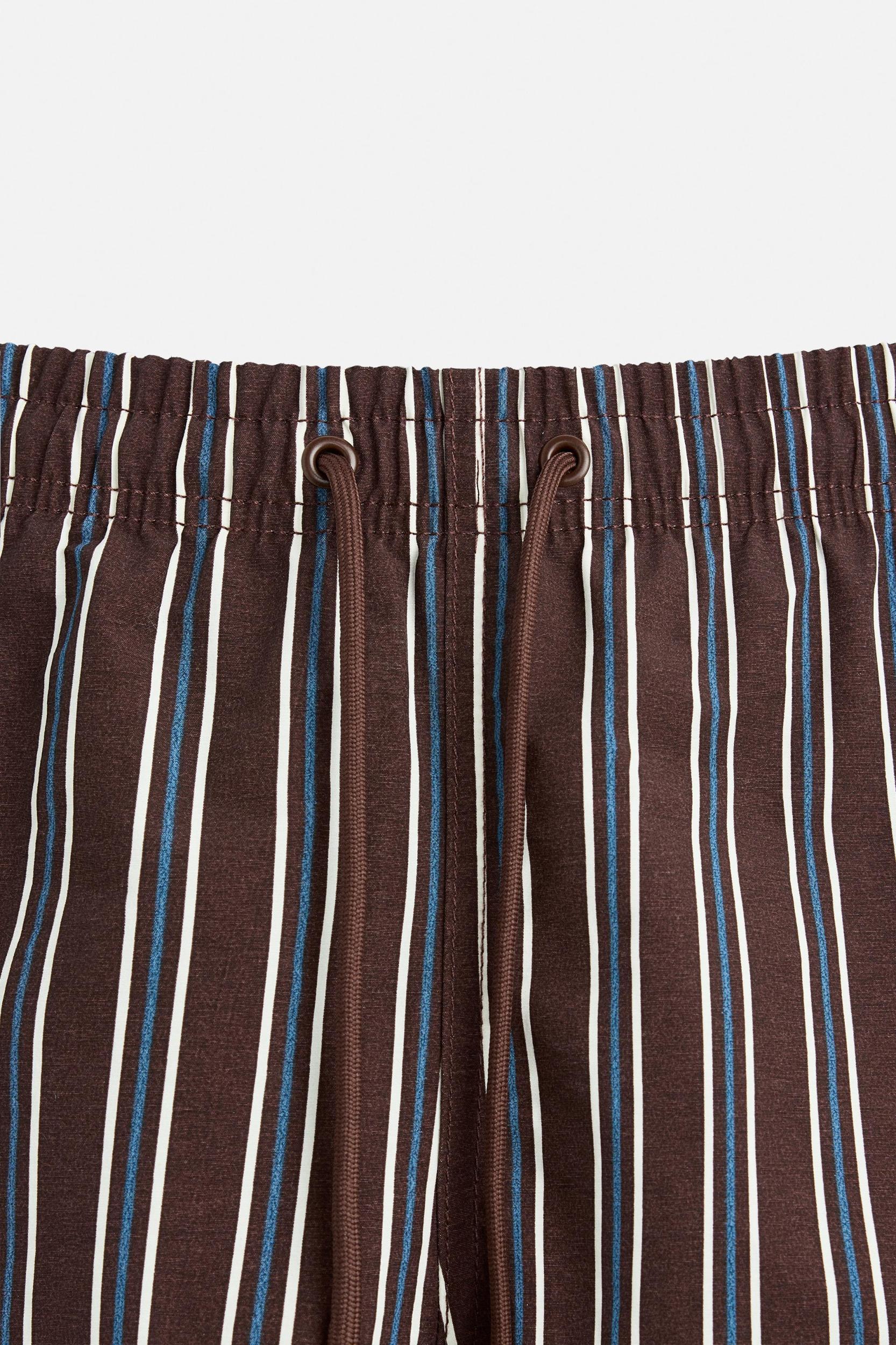 STRIPED MID-LENGTH SWIMSUIT Product Image