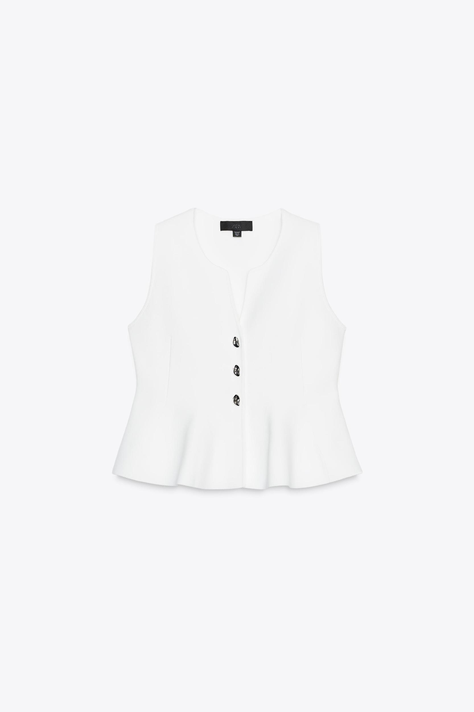 PEPLUM KNIT TOP Product Image