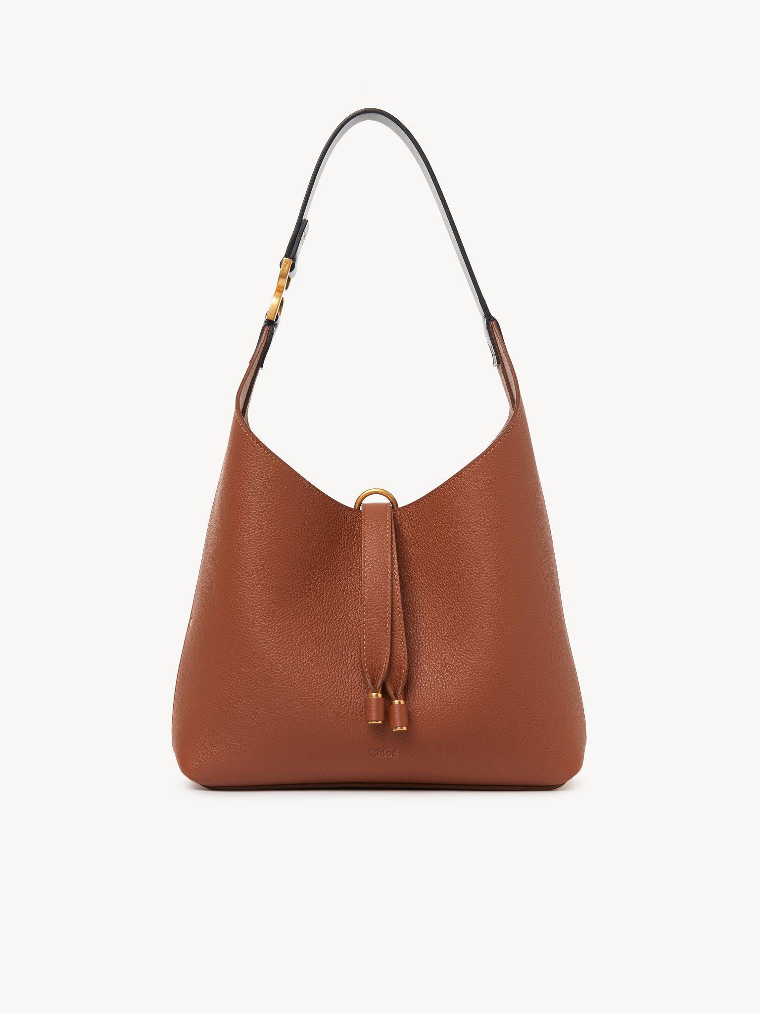 Small Marcie hobo bag in grained leather Product Image