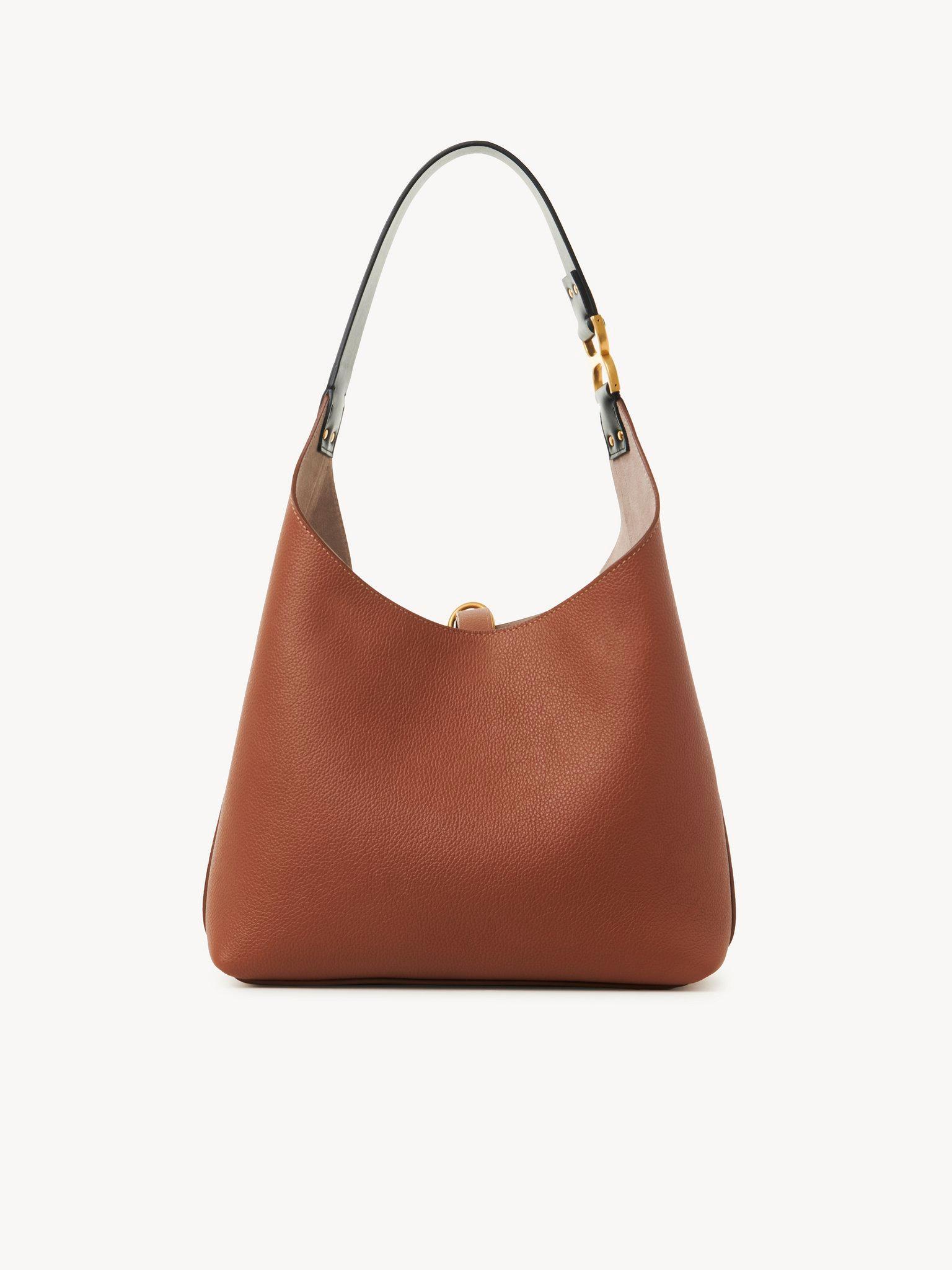 Small Marcie hobo bag in grained leather Product Image