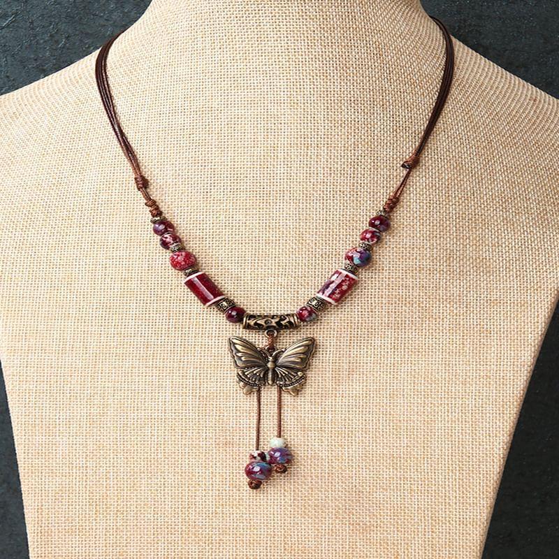 Butterfly Pendant Beaded String Necklace Product Image