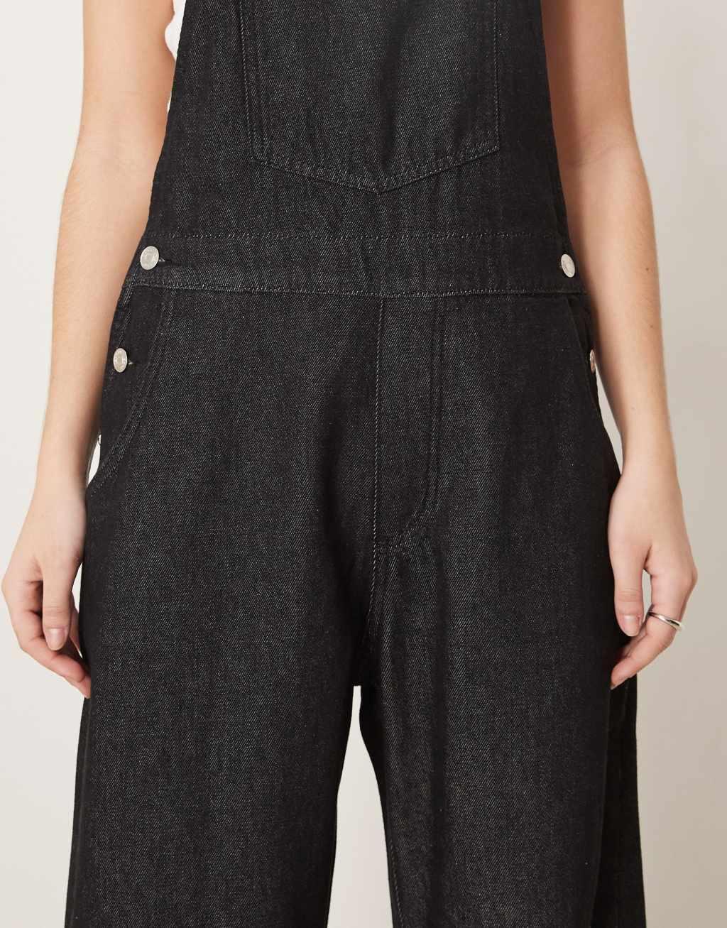 ASOS DESIGN barrel leg denim overalls in black Product Image