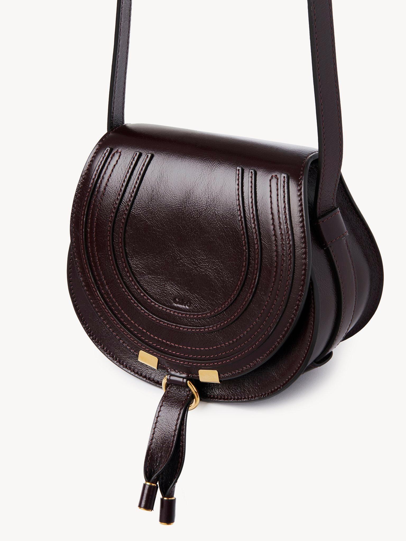 Small Marcie saddle bag in shiny leather Product Image