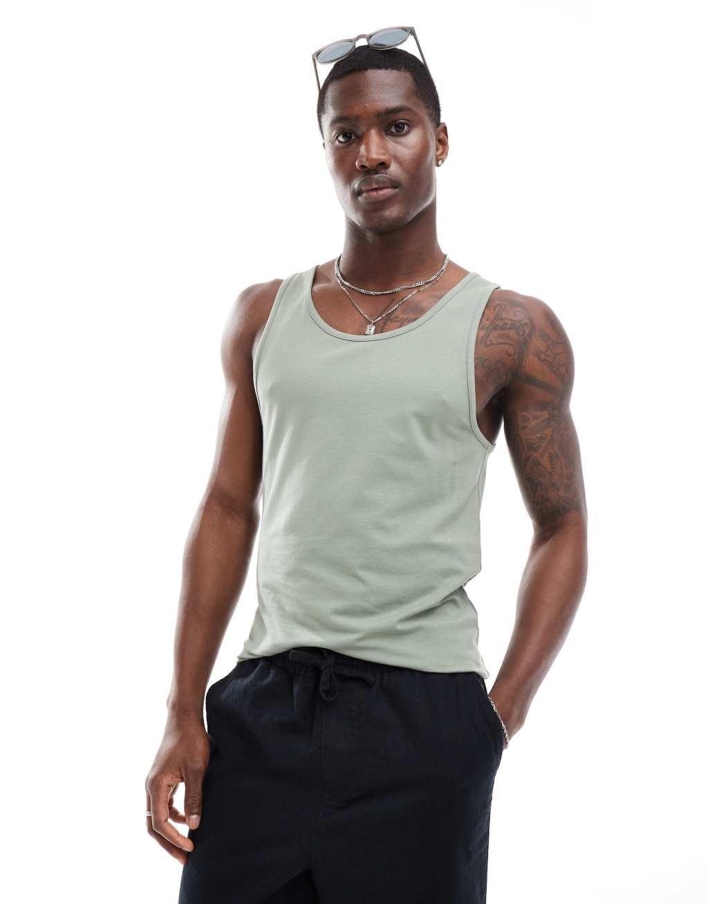 ASOS DESIGN muscle fit tank top in mid green Product Image