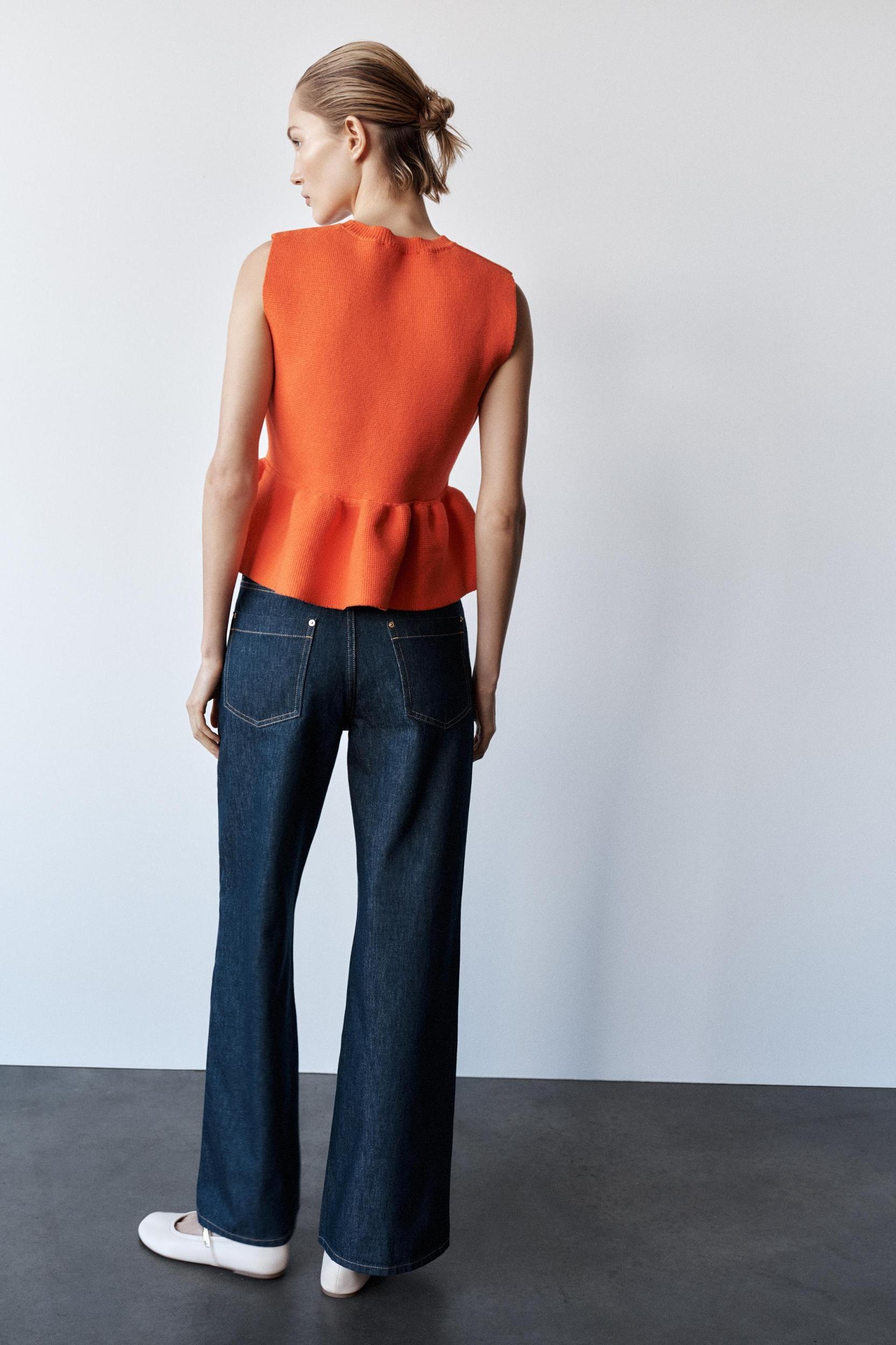 KNIT PEPLUM TOP Product Image