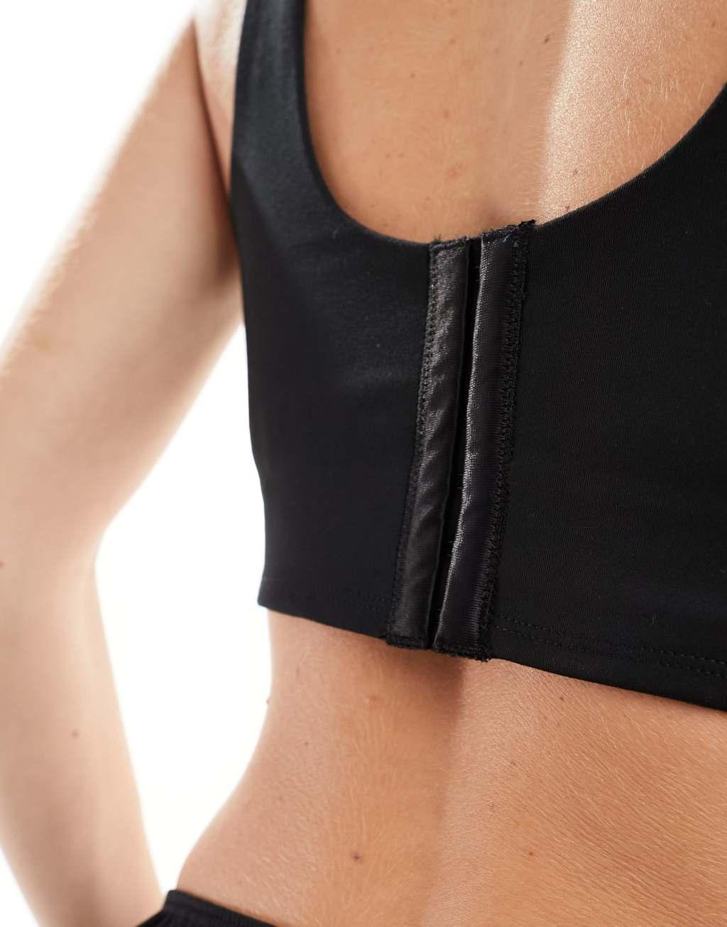 Nike swoosh corset light-support bra in black Product Image