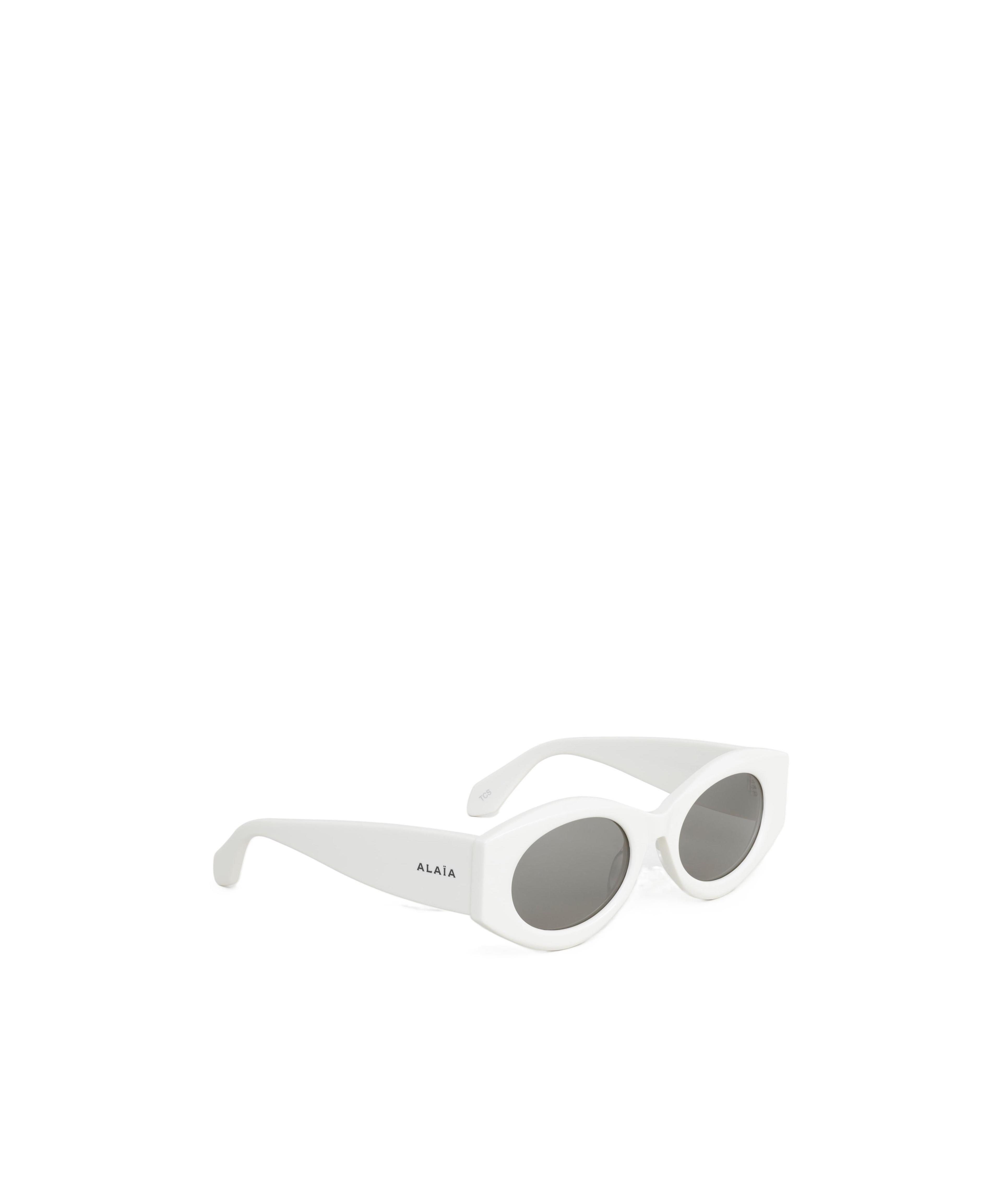 ALAÏA Oval Sunglasses In White Product Image