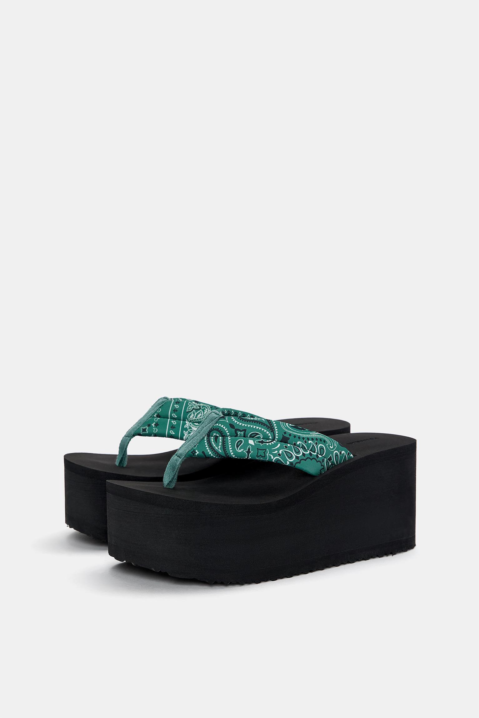 Wedge sandals with detail Product Image