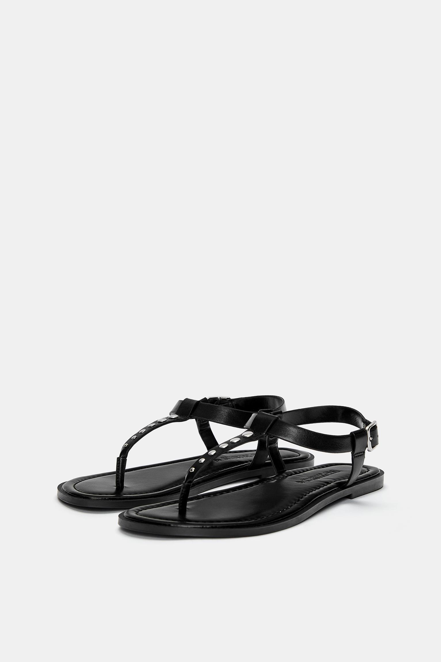 Flat sandals with decorations Product Image