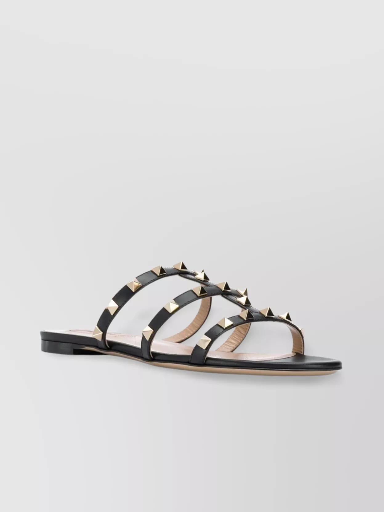 VALENTINO GARAVANI Studded Leather Flat Sandals In Black Product Image