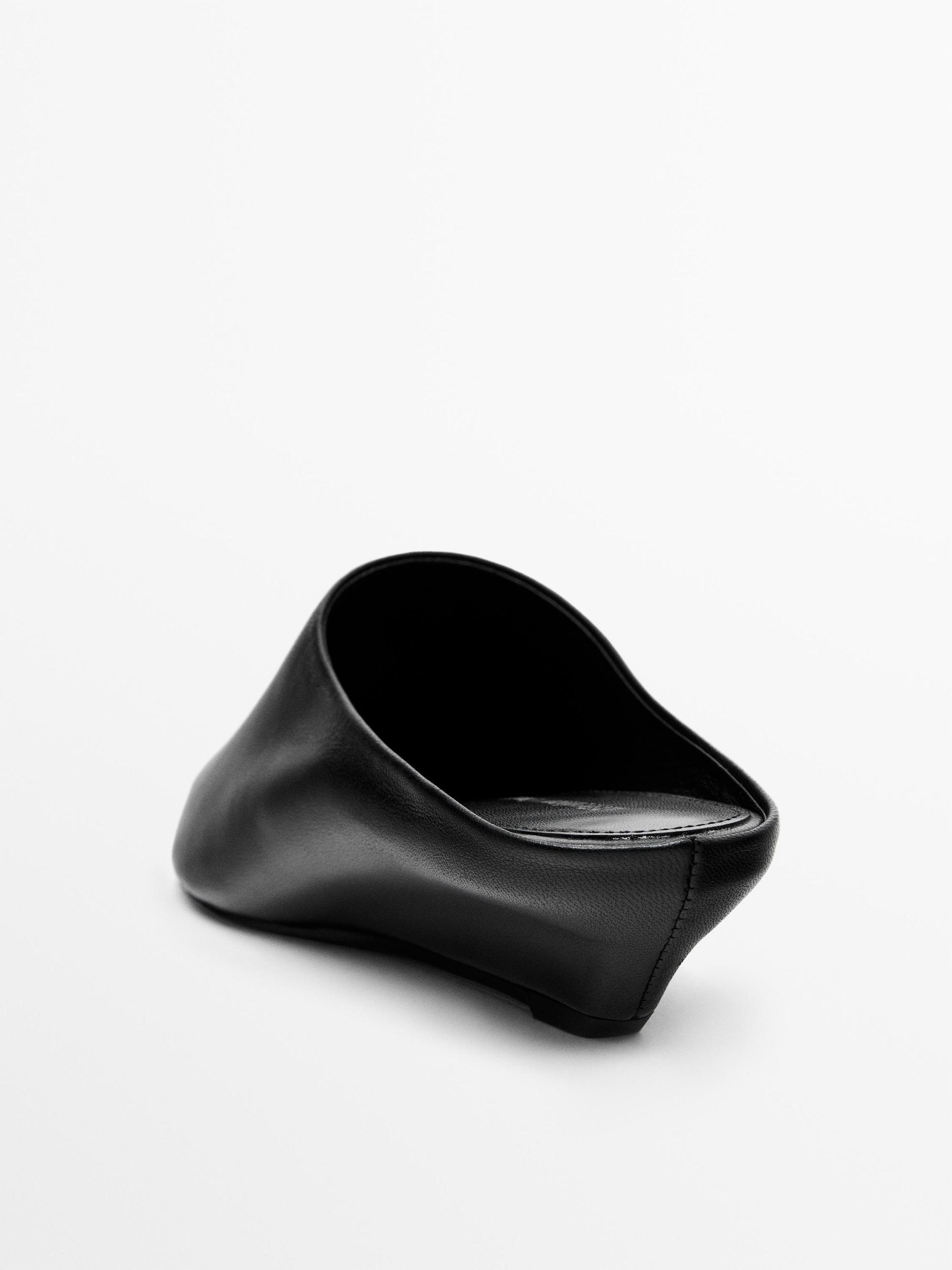 Wedge heeled mules Product Image