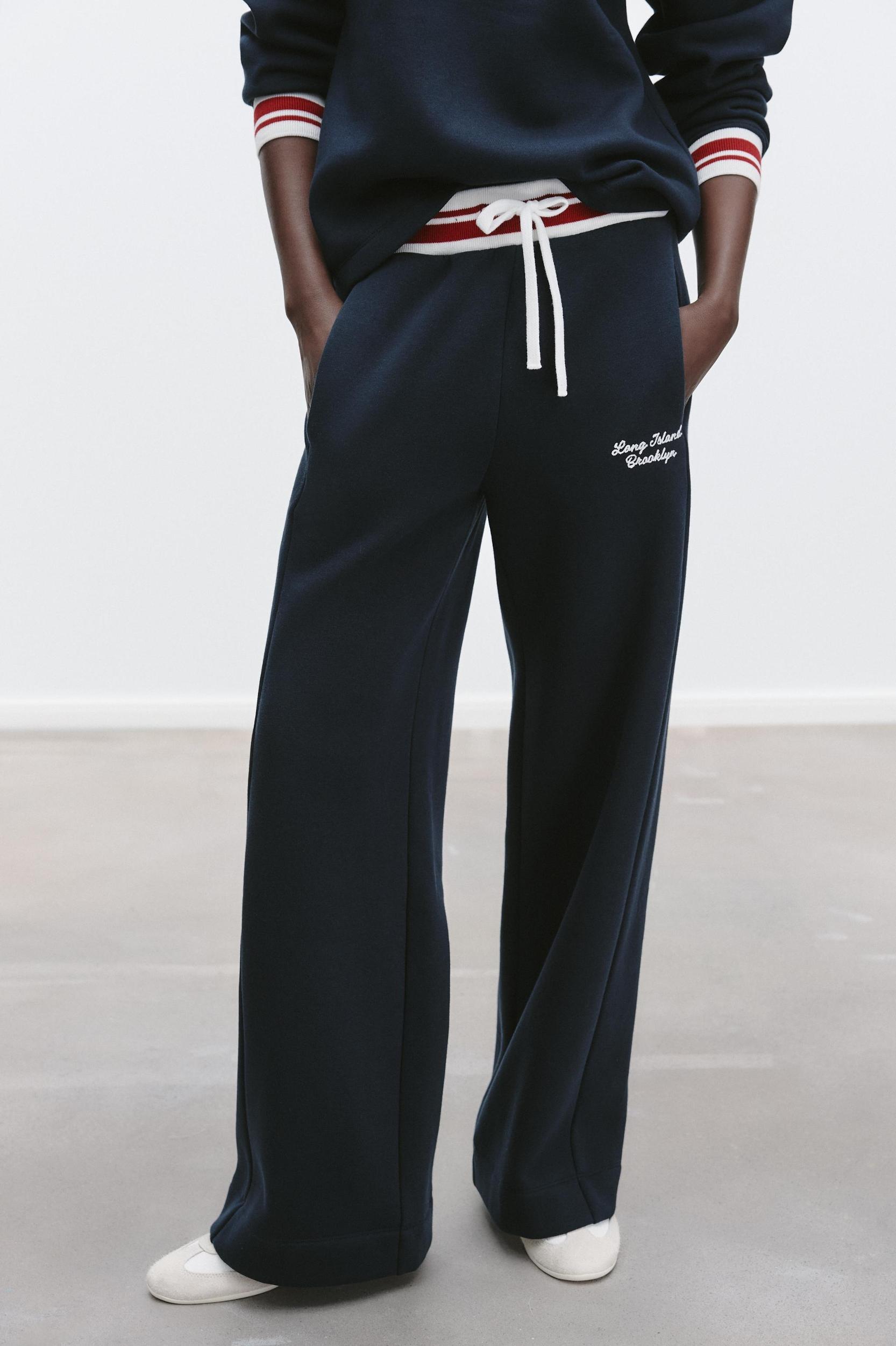 EMBROIDERED TEXT PANTS Product Image