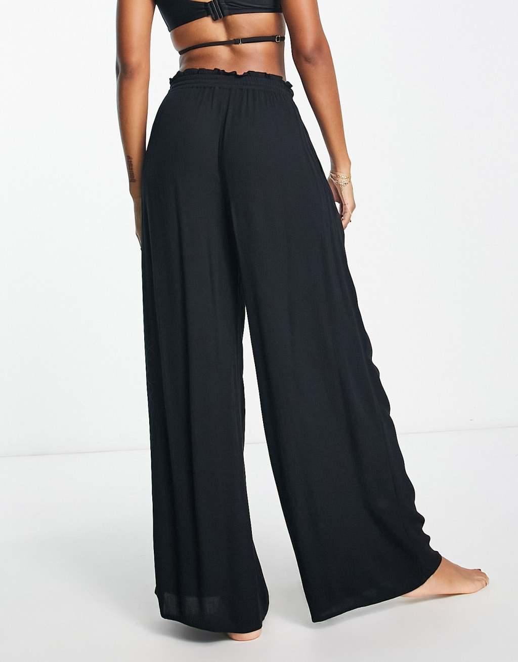 Iisla & Bird Exclusive beach drawstring pants in black   Product Image