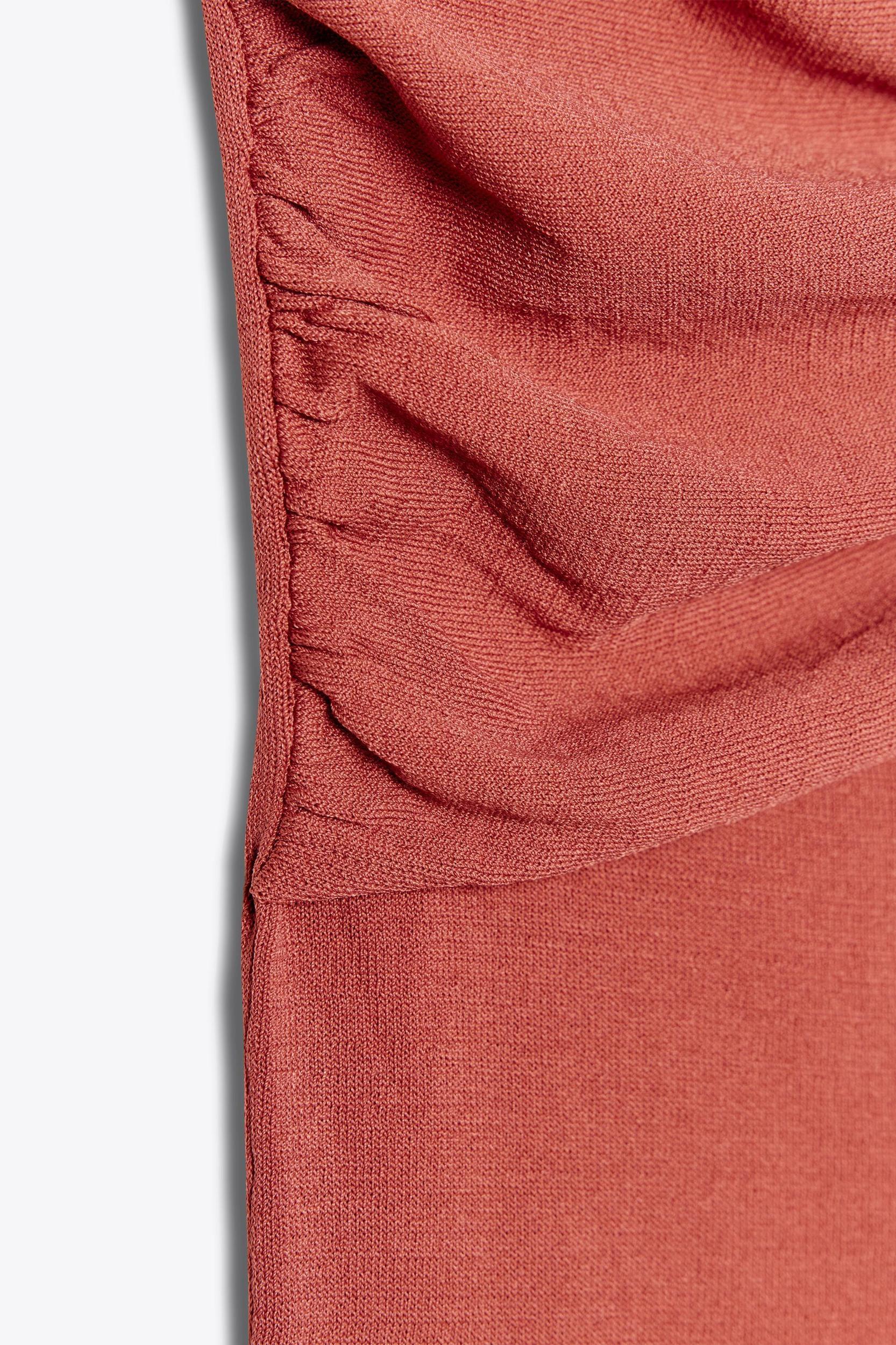 DRAPED KNIT ASYMMETRIC TOP Product Image