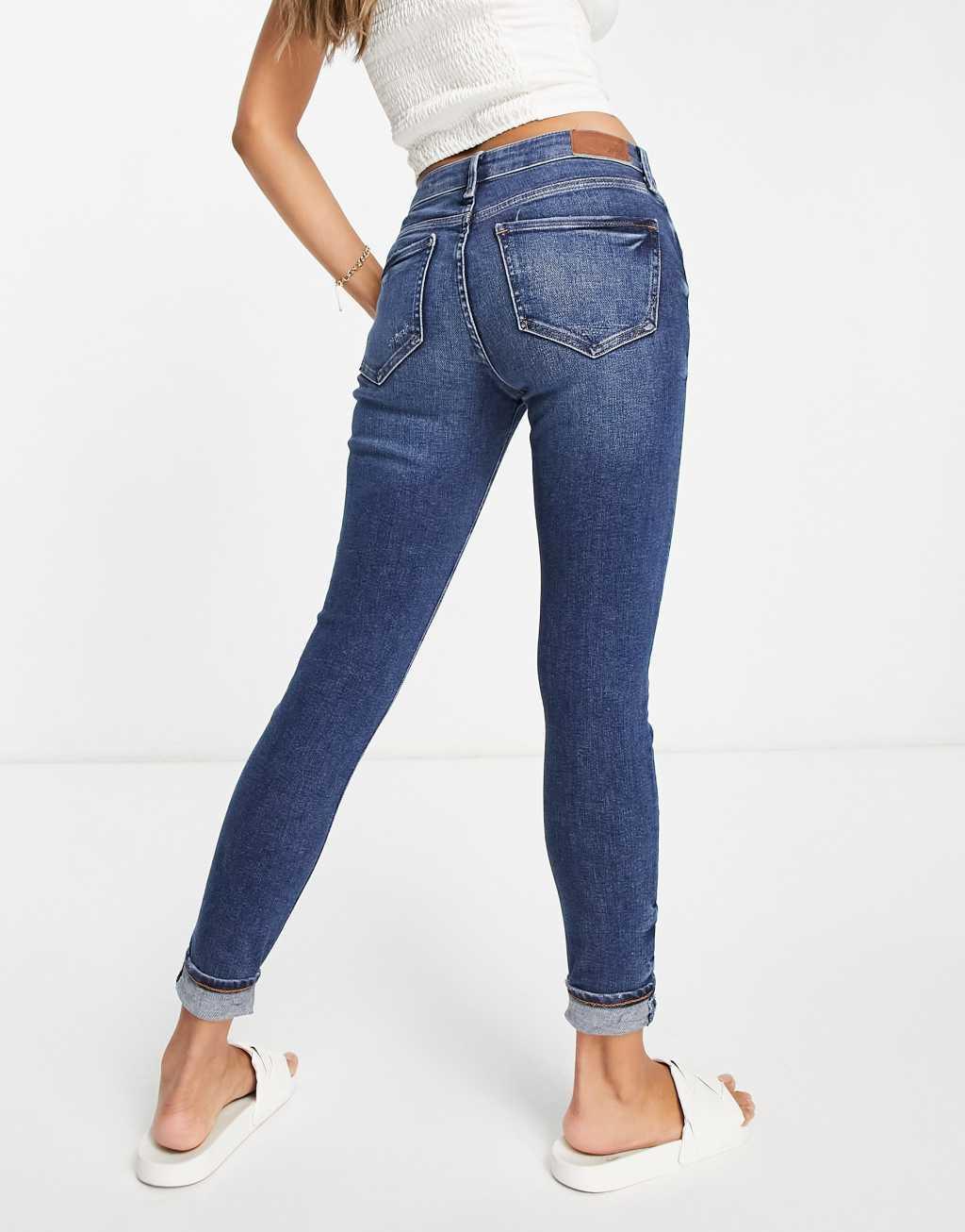 River Island mid rise turnup skinny jeans in mid blue Product Image