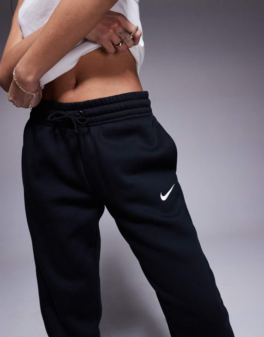 Nike Phoenix Fleece cuffed sweatpants in black Product Image