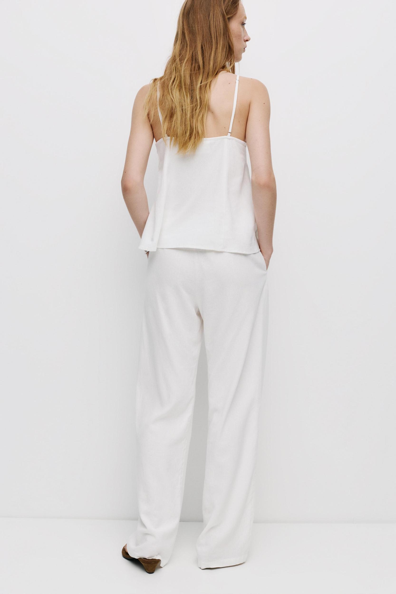 Strappy top with linen Product Image