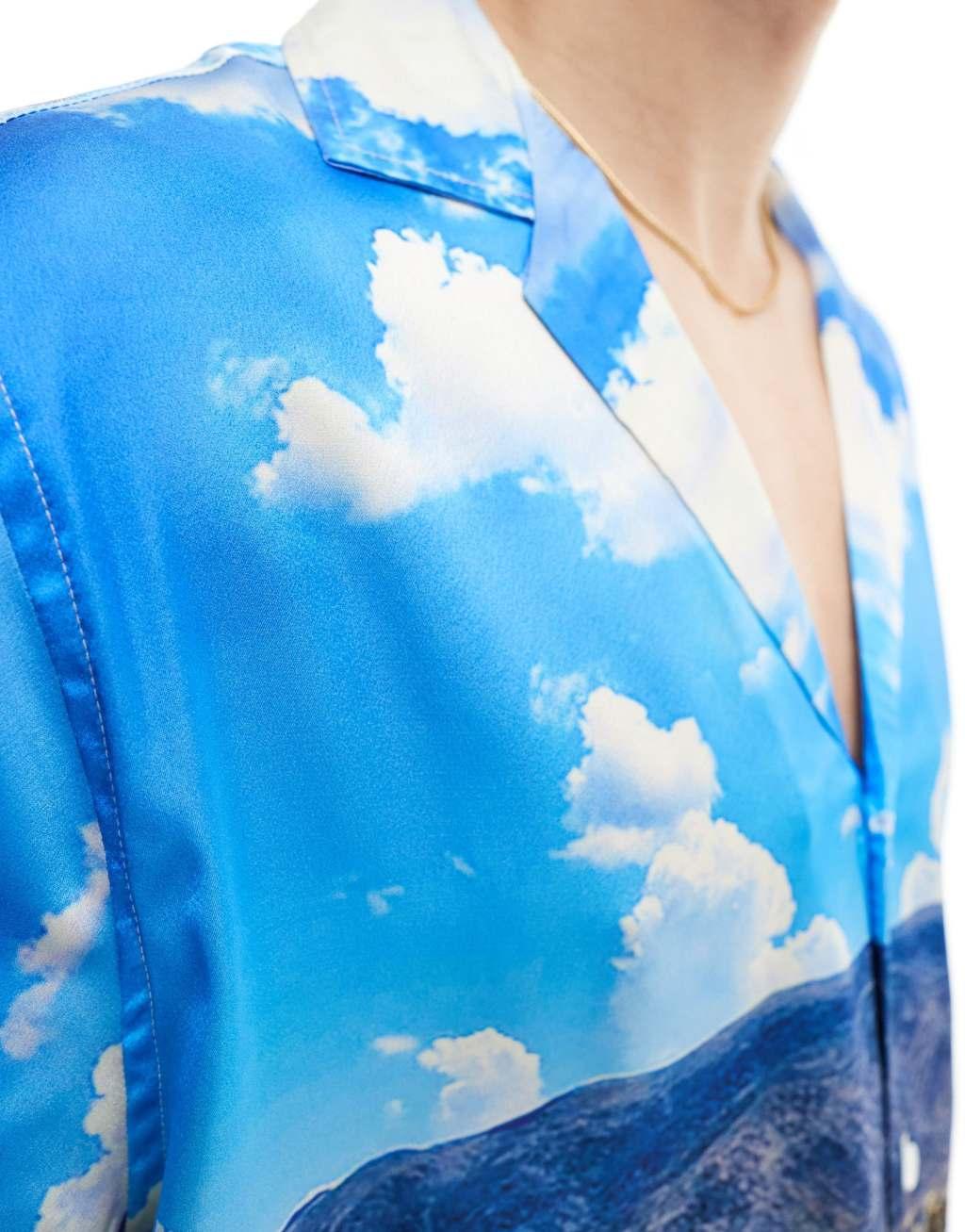 ASOS DESIGN relaxed deep revere satin shirt with scenic desert print Product Image