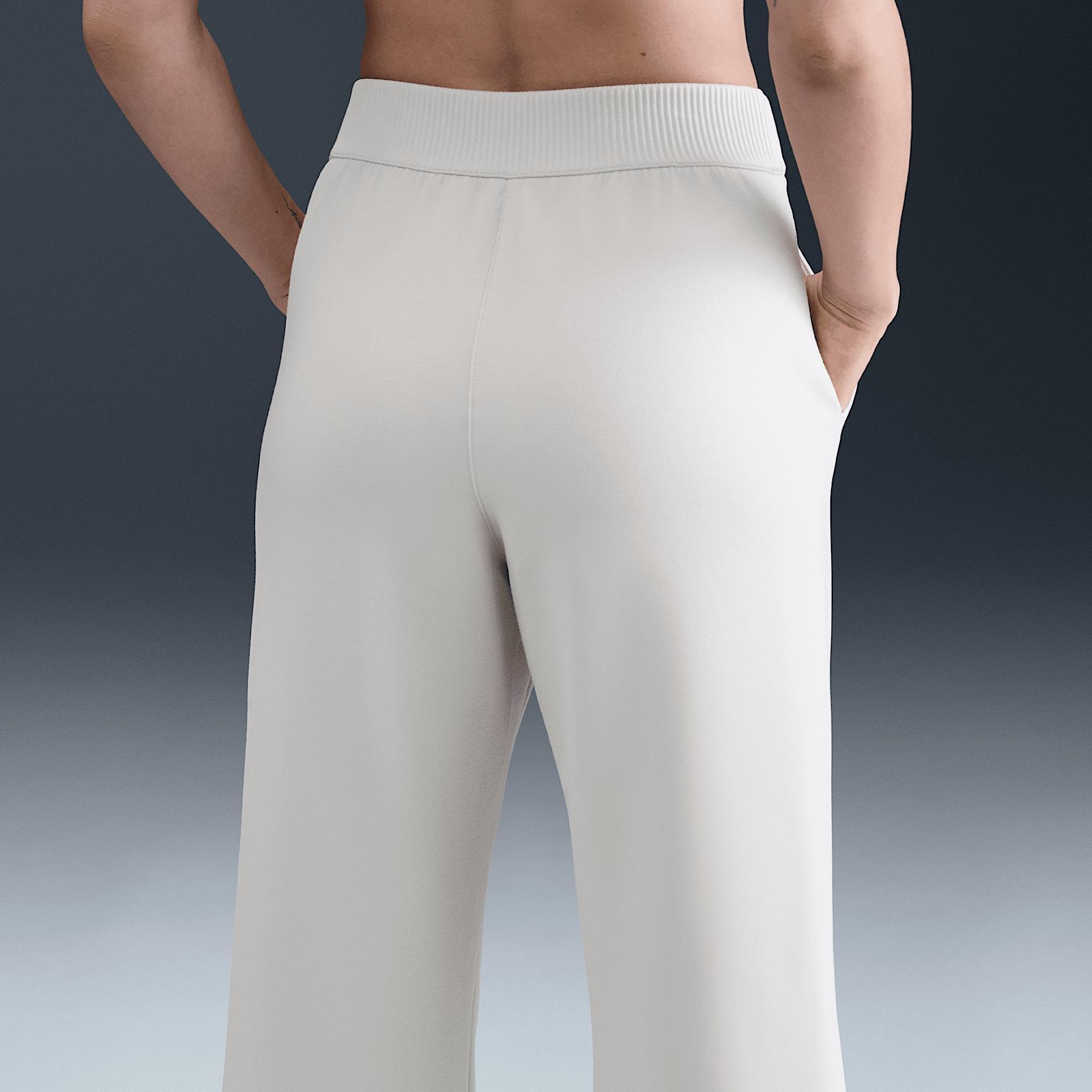 Nike Womens 24.7 ImpossiblySoft Dri-FIT High-Waisted Loose Flared Pants | HQ8607-104 Product Image