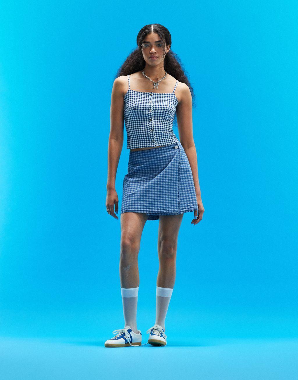 ASOS DESIGN denim wrap mini skirt in blue gingham print Product Image