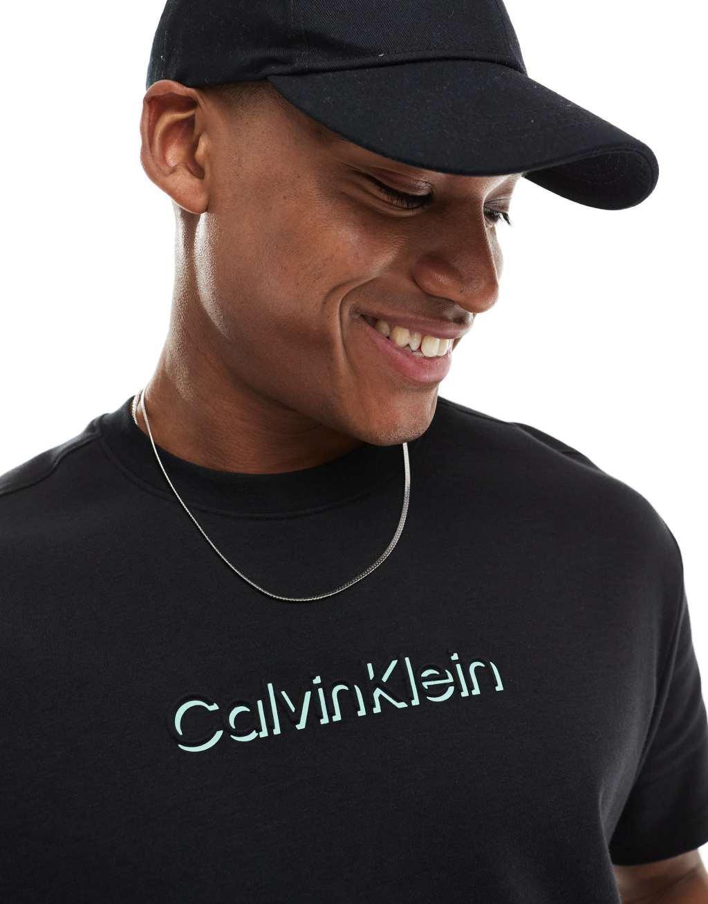 Calvin Klein shadow embossed logo t-shirt in black Product Image