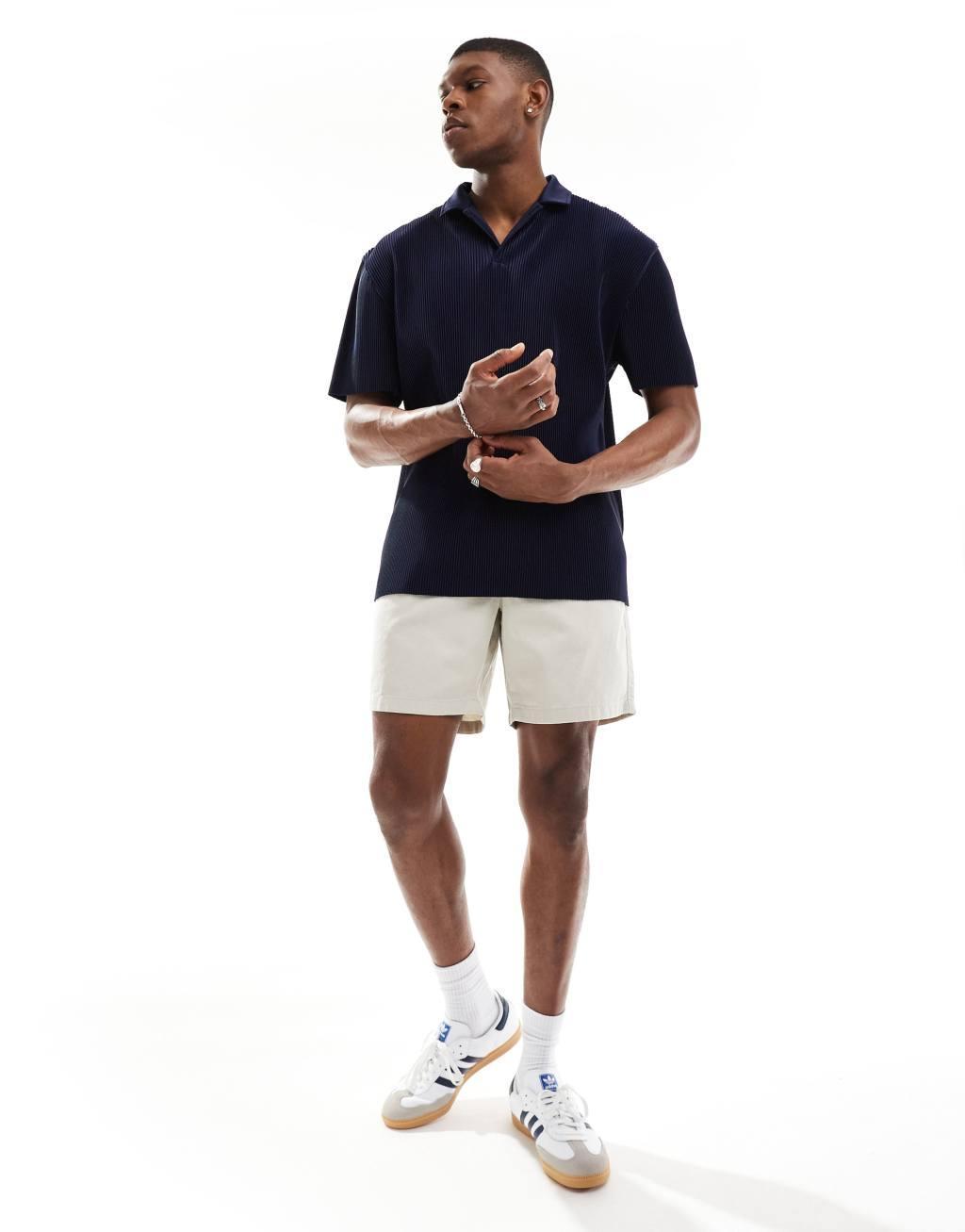 ASOS DESIGN relaxed revere plisse polo in navy Product Image