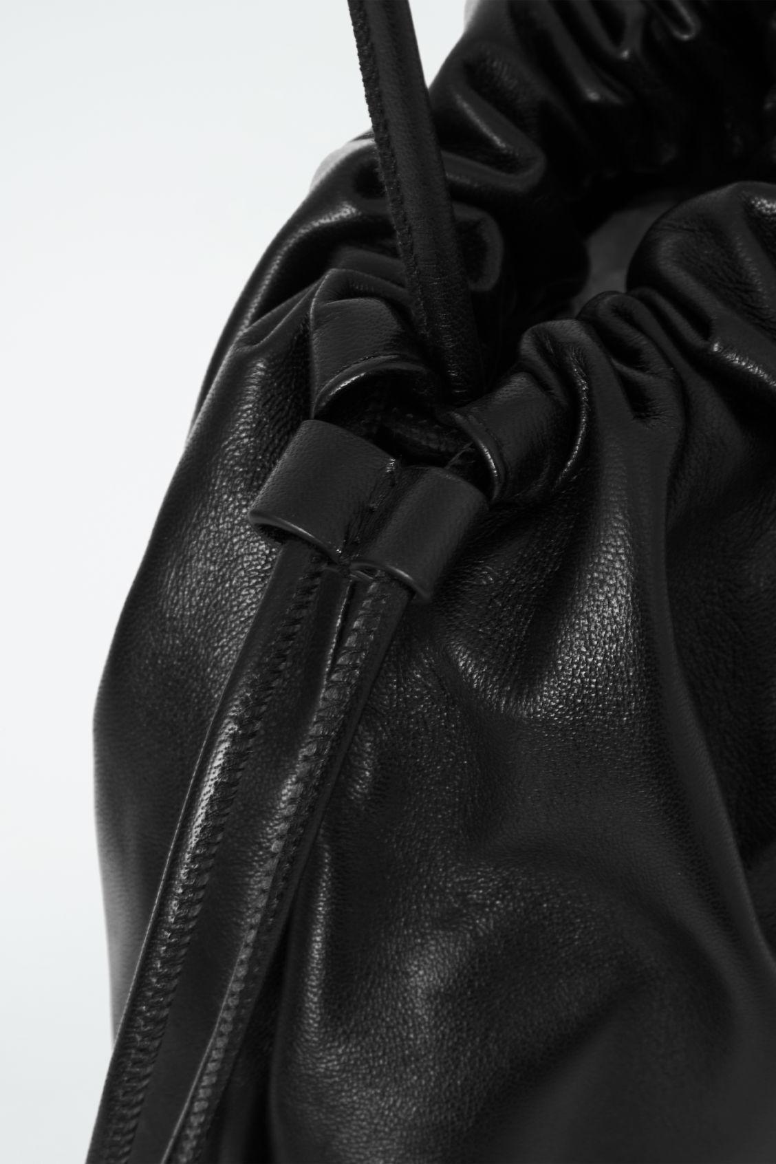 MINI CAVATELLI CLUTCH BAG - LEATHER Product Image