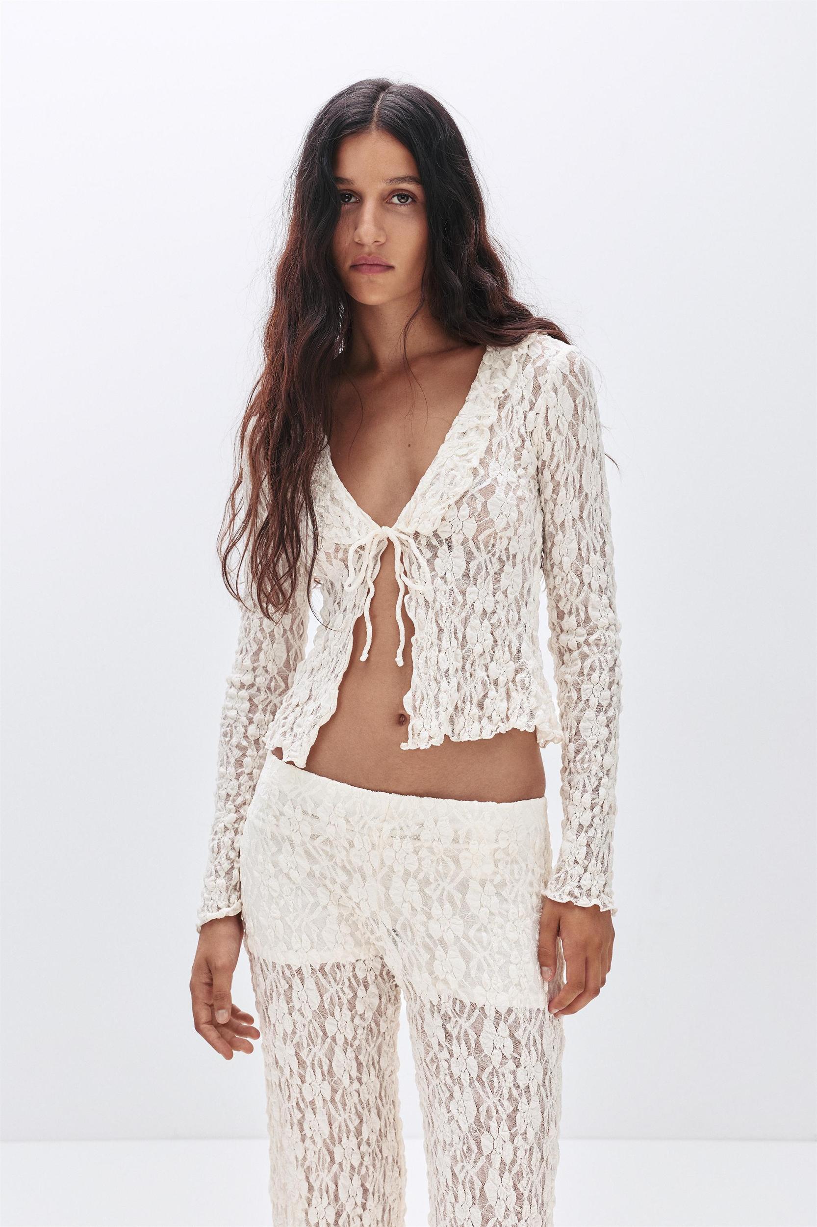 Lace blouse with ruffles Product Image