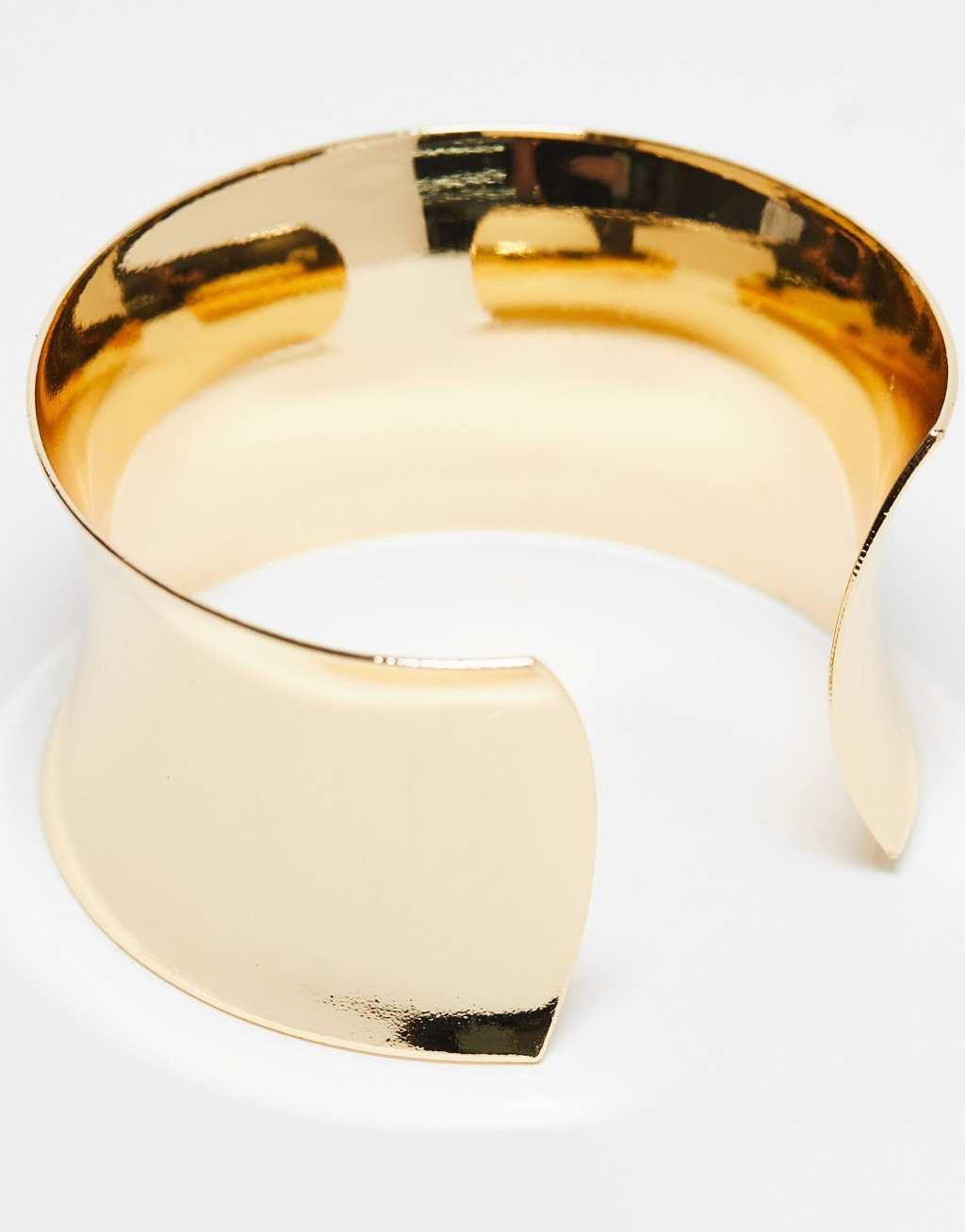 ASOS DESIGN wide cuff bracelet in gold tone Product Image