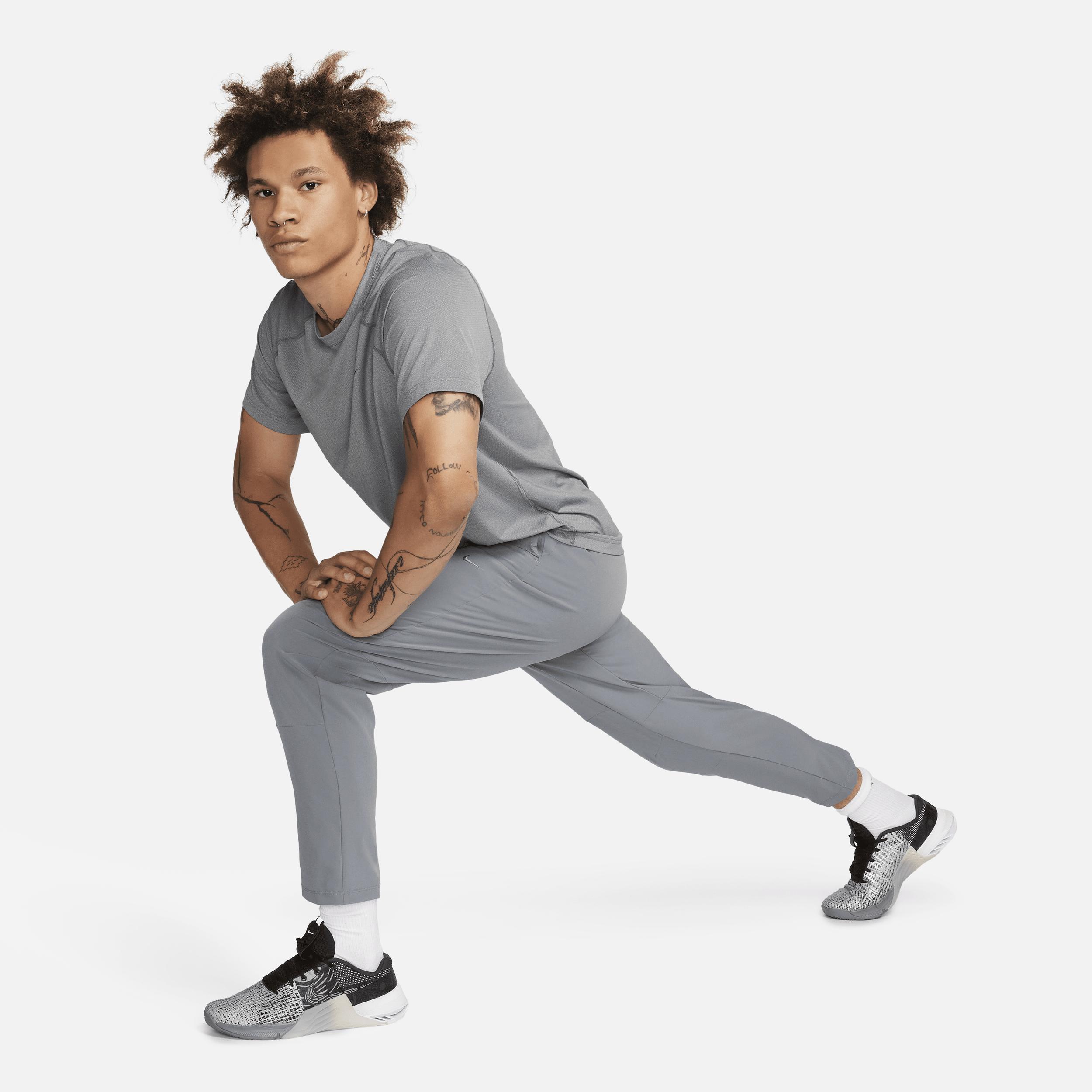 Nike Mens Unlimited Dri-FIT Tapered Leg Versatile Pants Product Image