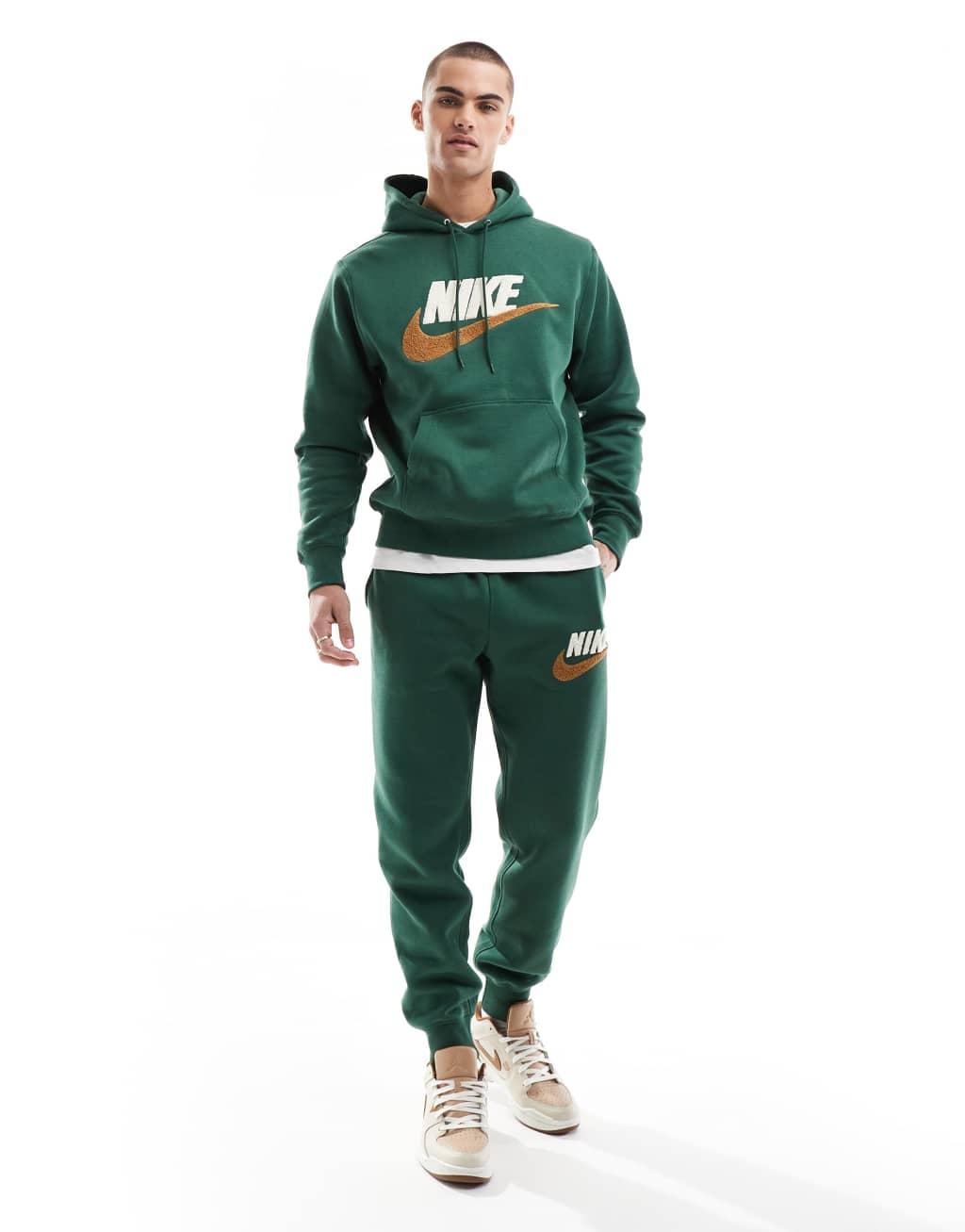 Nike Club chenille logo hoodie in green Product Image