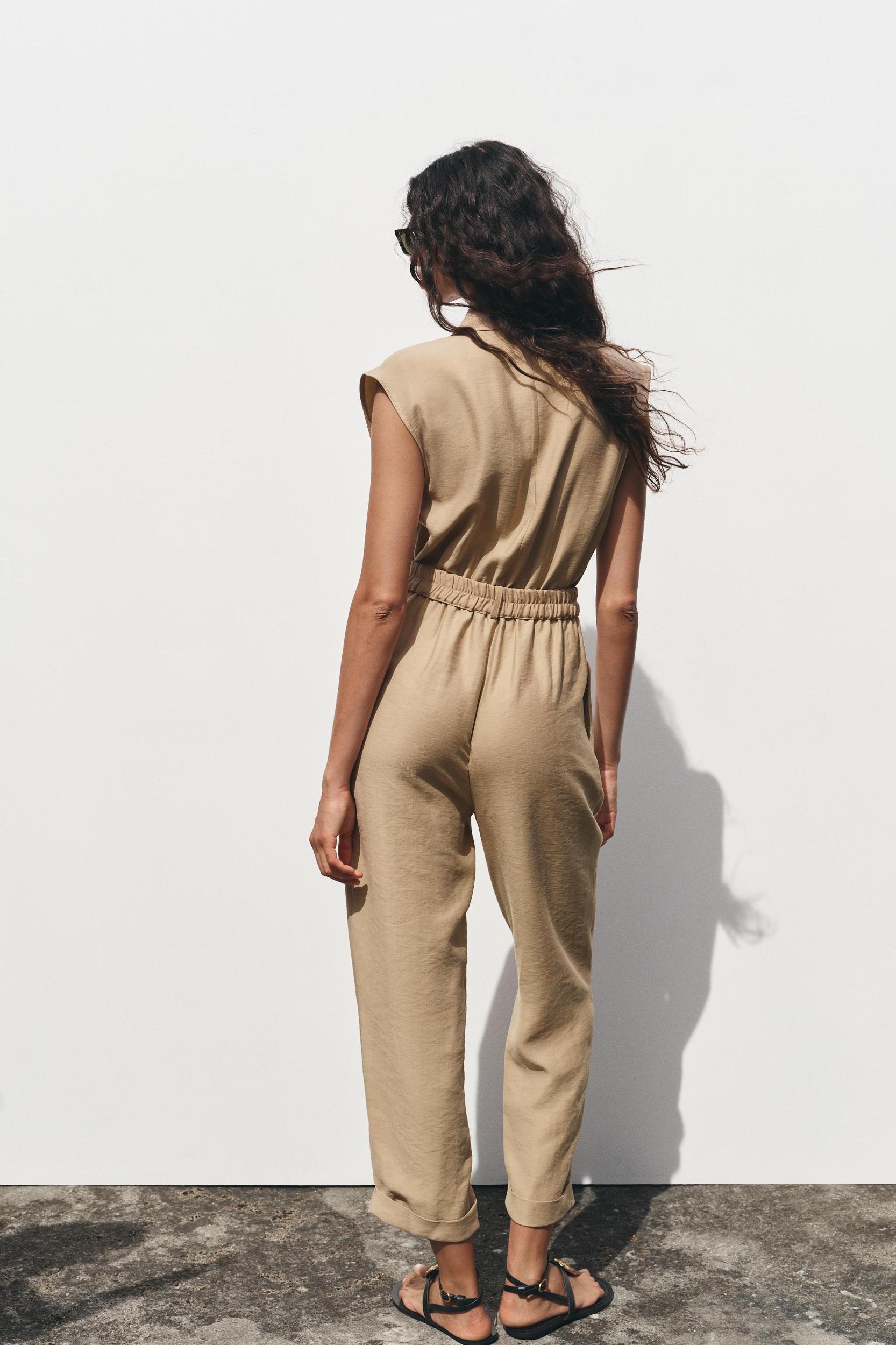 SLEEVELESS BELTED JUMPSUIT Product Image