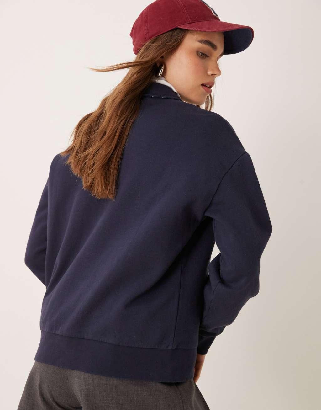 GANT logo polo sweatshirt with tartan collar in navy Product Image