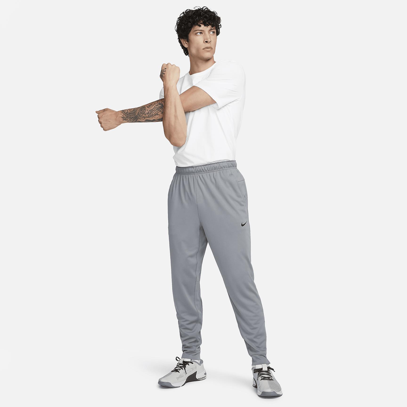 Nike Mens Totality Dri-FIT Tapered Versatile Pants | FB7509-084 Product Image
