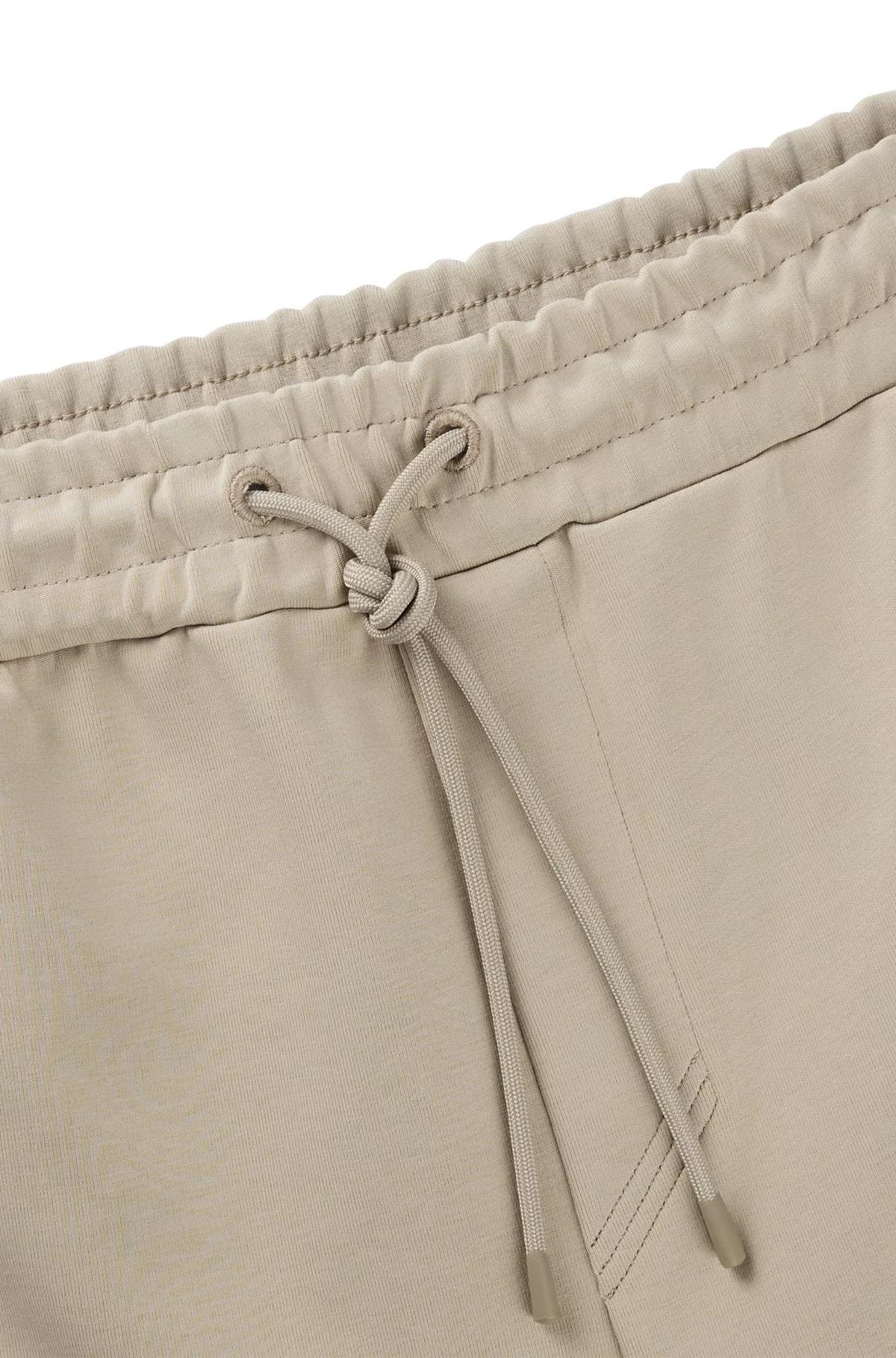 Tracksuit bottoms with tape inserts Product Image