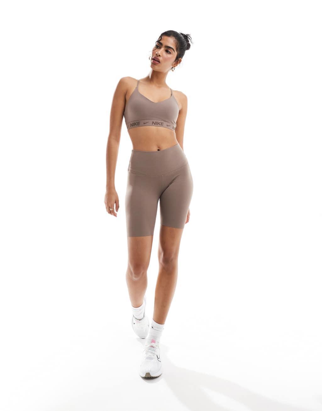 Nike Training Indy light support sports bra in brown Product Image