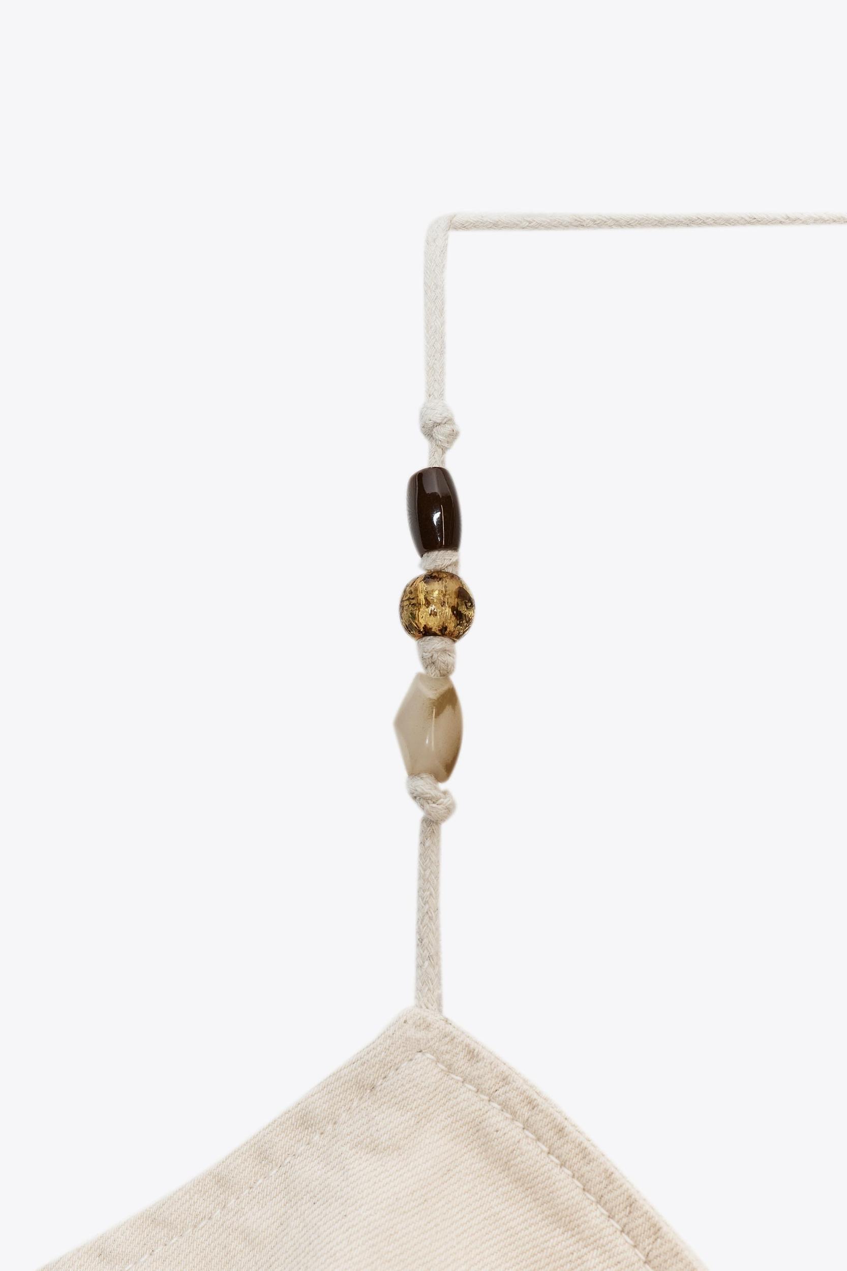 BEADED DENIM HALTER TOP Product Image