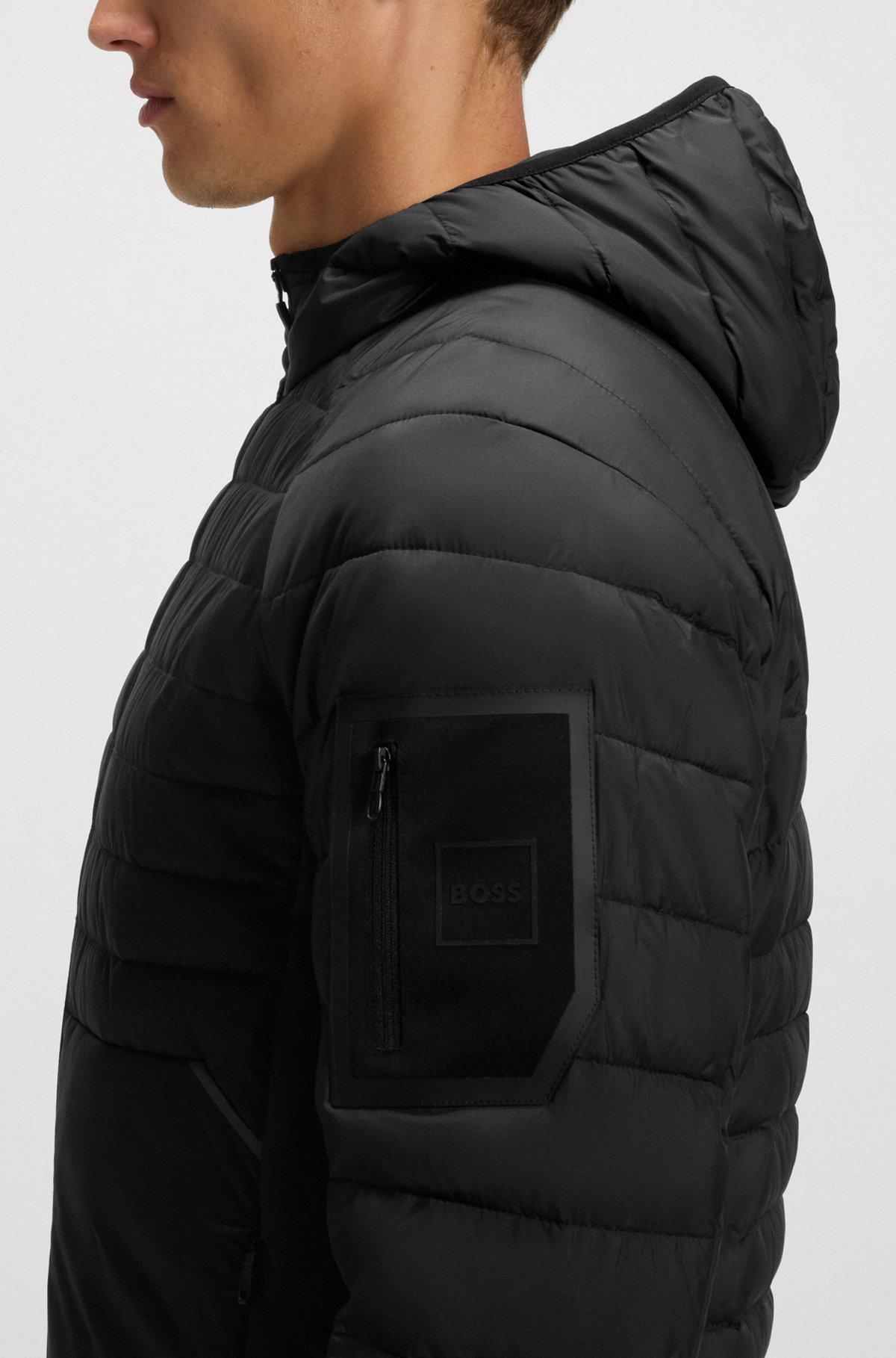 Water-repellent hooded jacket with decorative reflective details Product Image