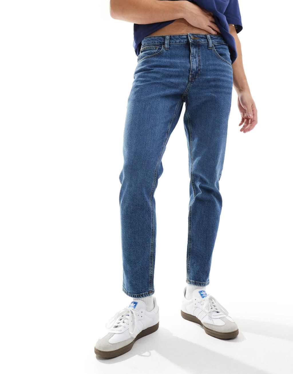 ASOS DESIGN stretch tapered jeans in dark wash blue Product Image