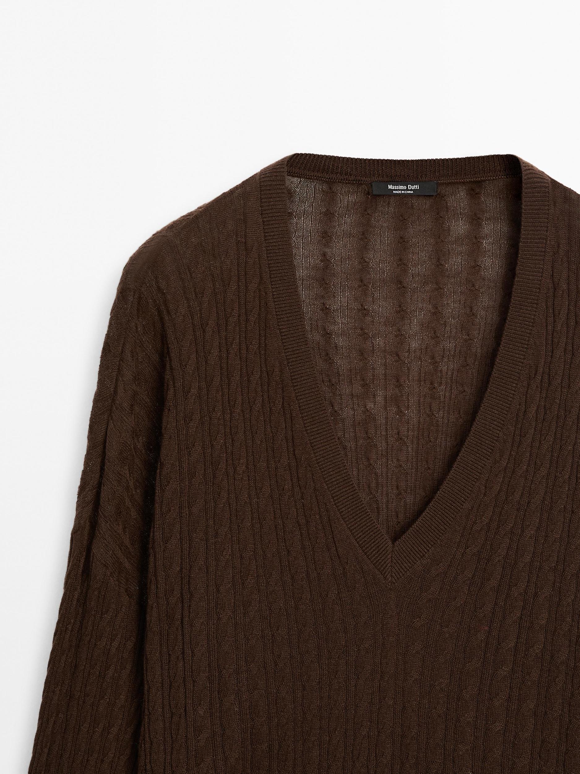 V-neck cable-knit sweater Product Image