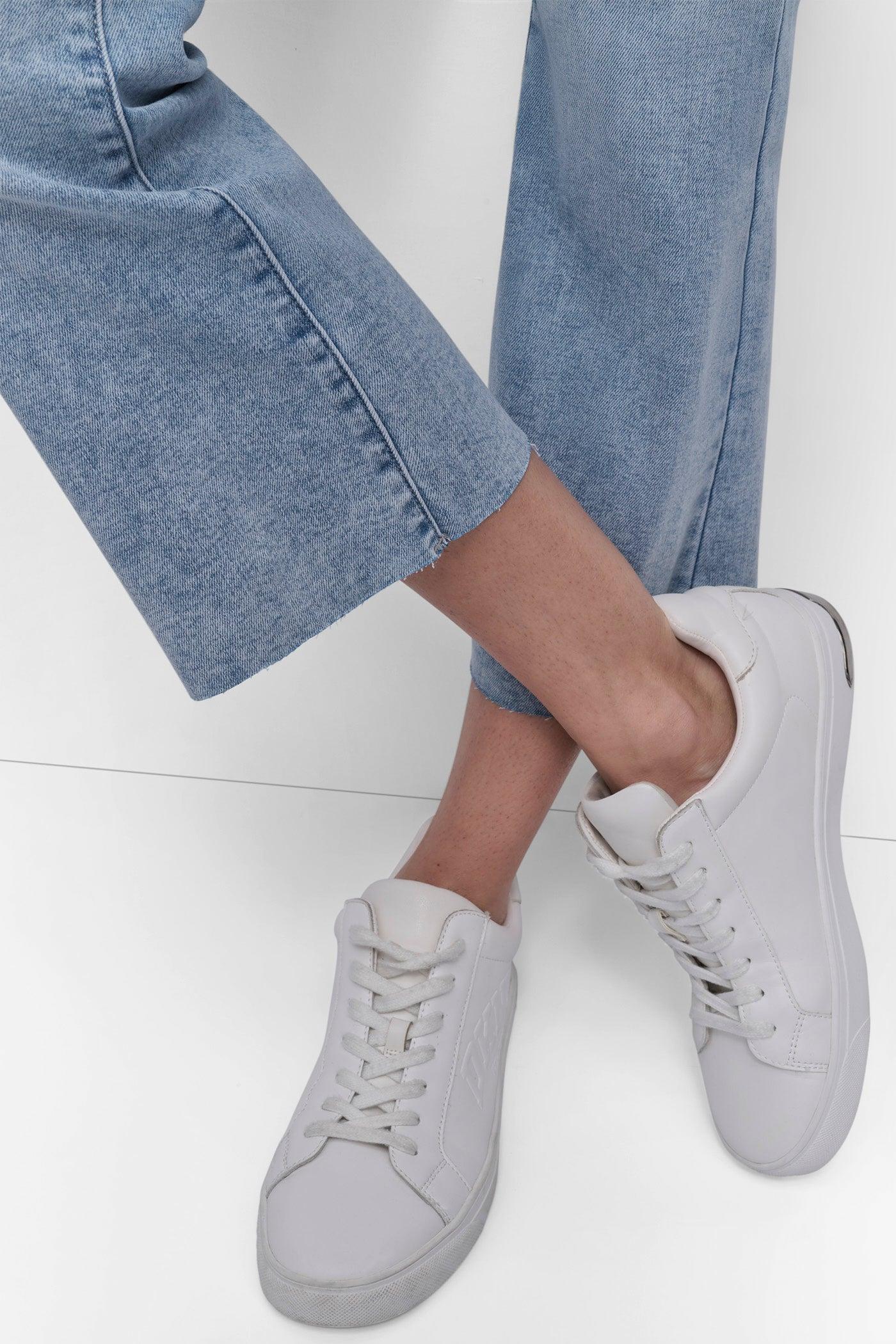 HIGH-RISE RAW EDGE FLARE JEAN Product Image