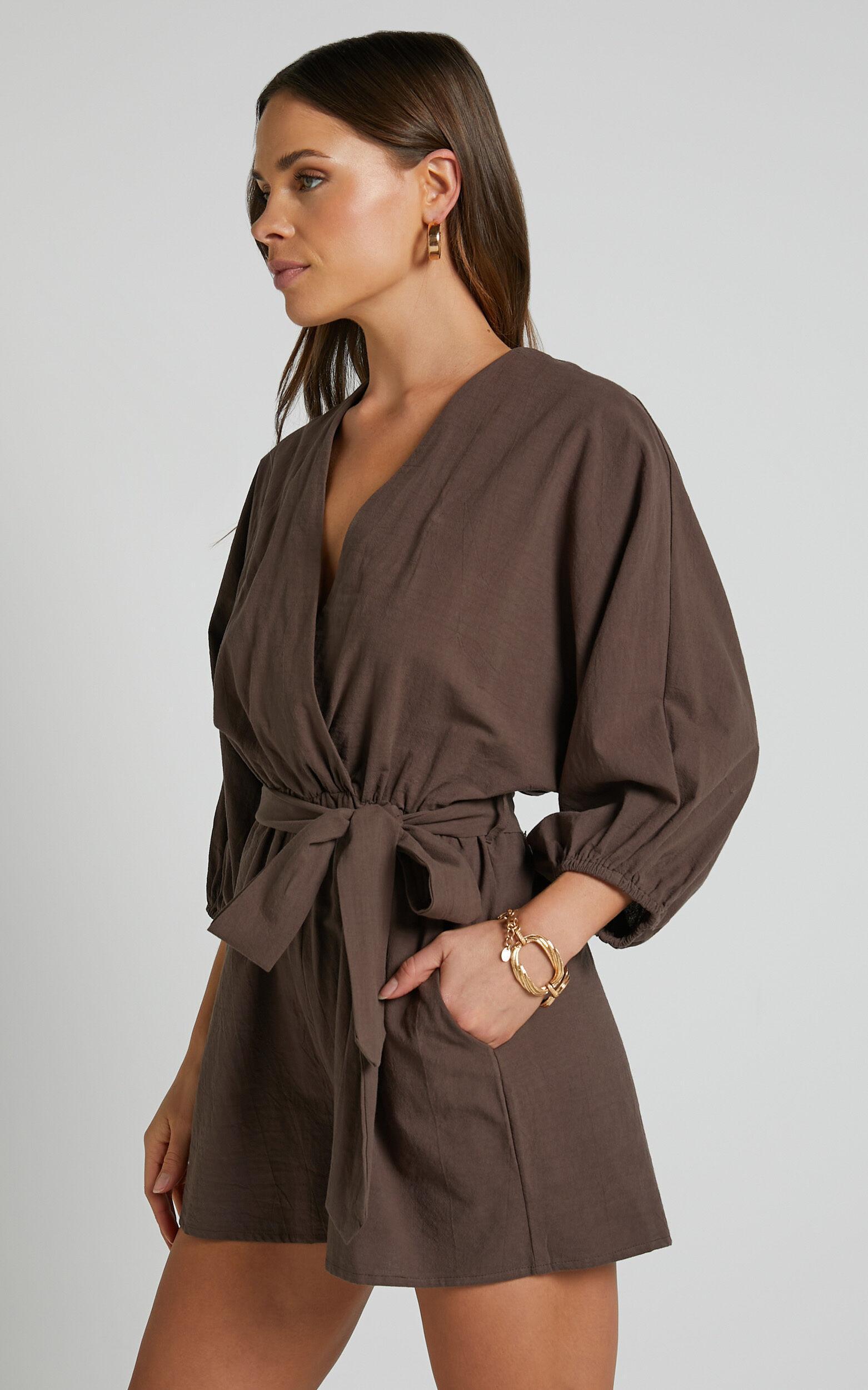 Kiro Playsuit - Linen Look V Neck Puff Sleeve Tie Waist Playsuit in Chocolate Product Image