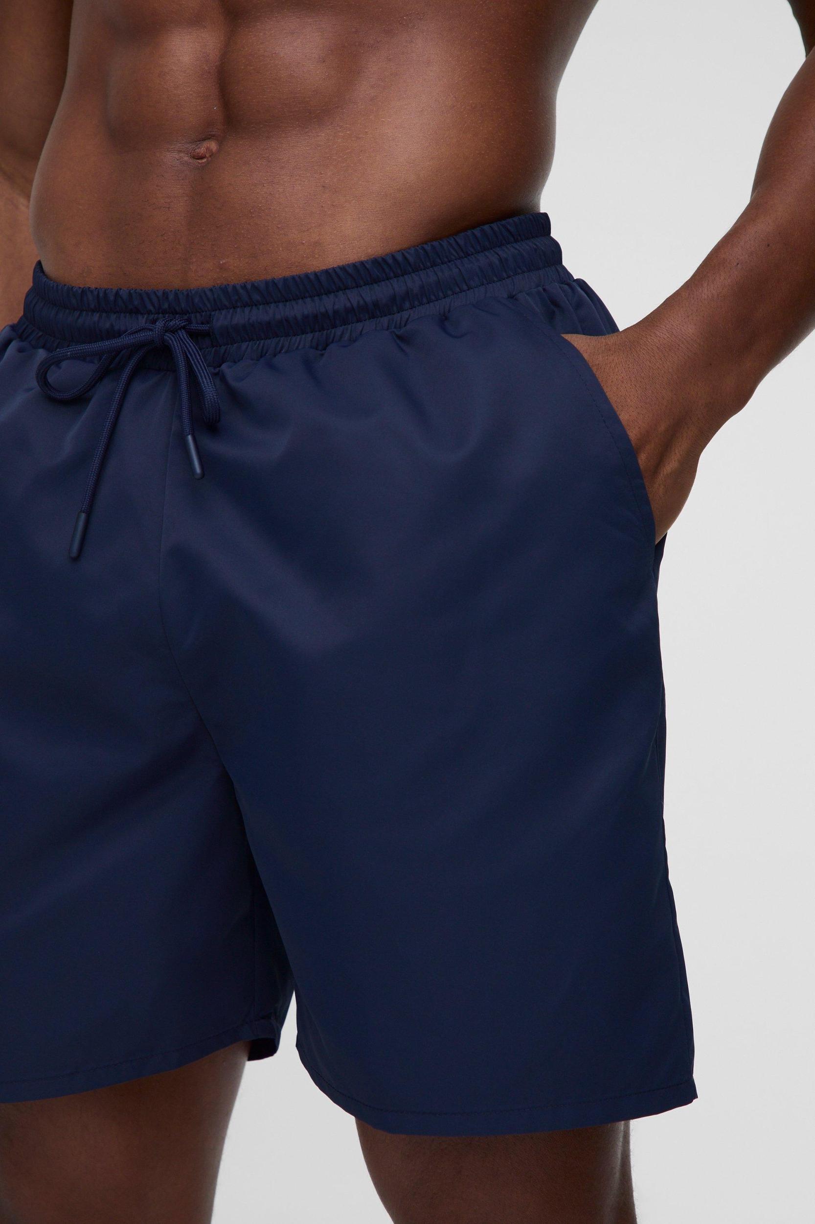 Mid Length Swim Trunks in Navy | boohooMAN USA Product Image