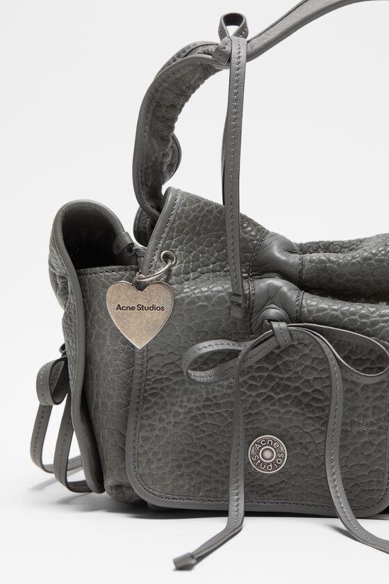 Multipocket grained leather bag Product Image